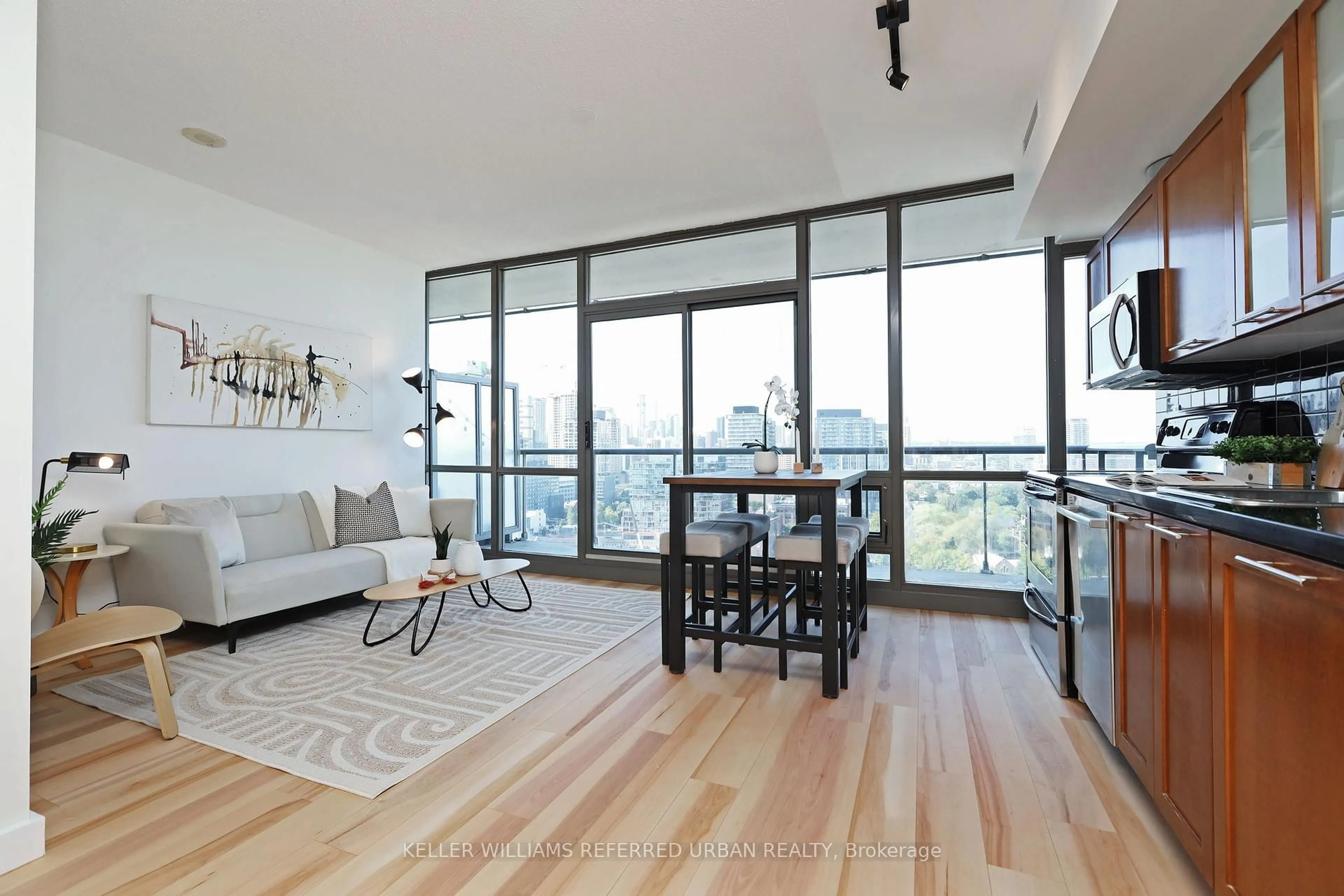 Living room with furniture, wood/laminate floor for 33 Mill St #1801, Toronto Ontario M5A 3R3