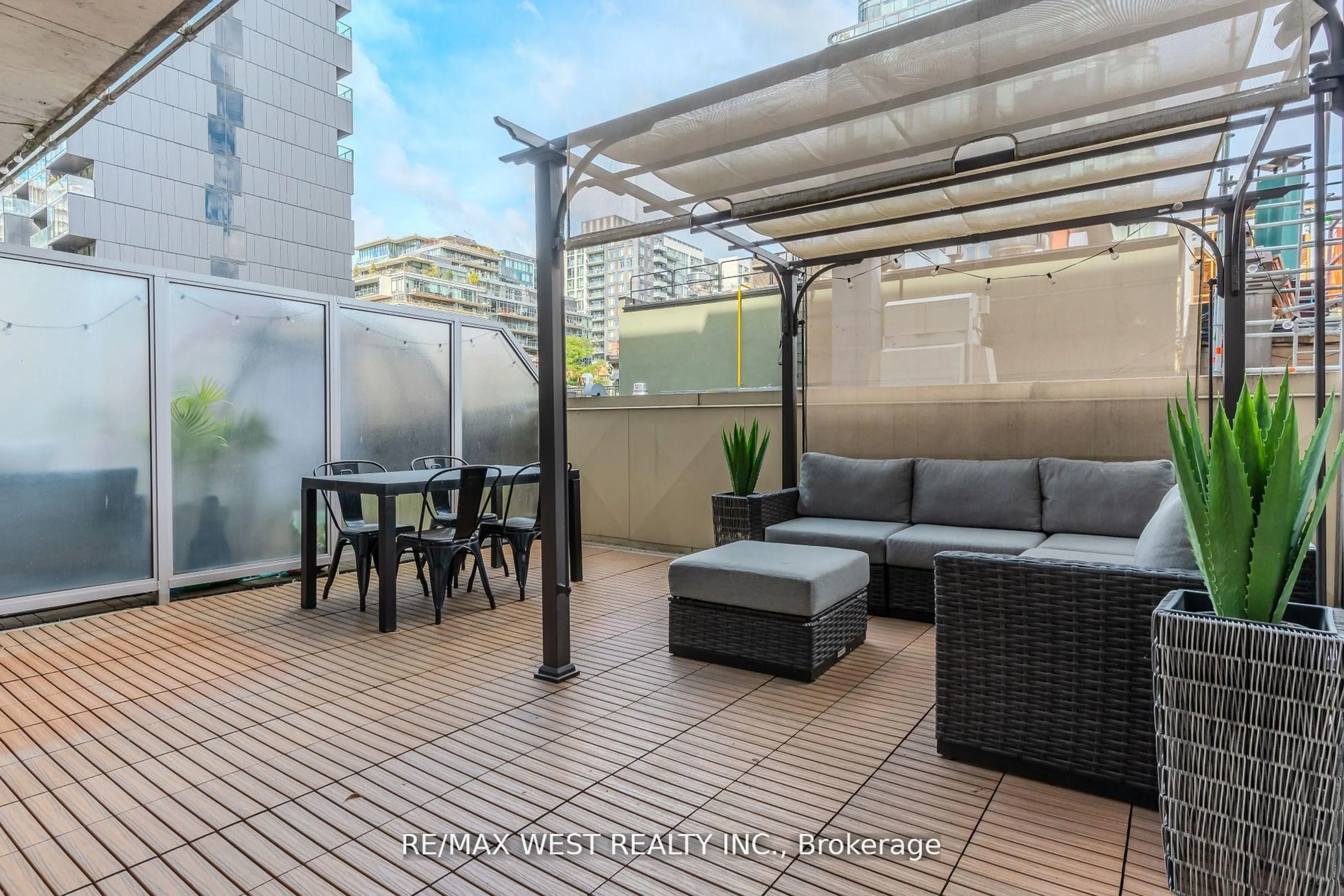 Patio, city buildings view from balcony for 66 Portland St #212, Toronto Ontario M5V 2M6