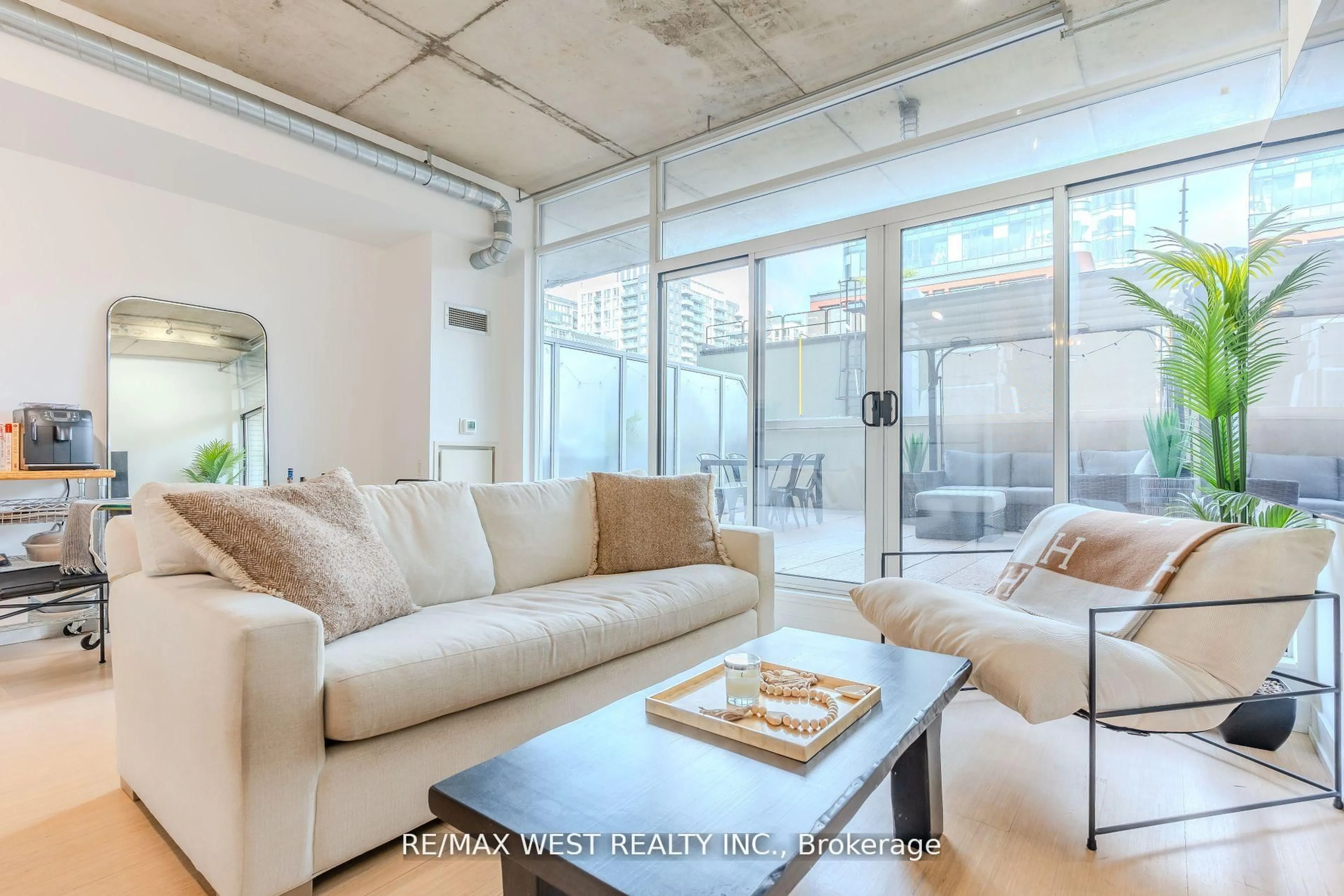 Living room with furniture, unknown for 66 Portland St #212, Toronto Ontario M5V 2M6