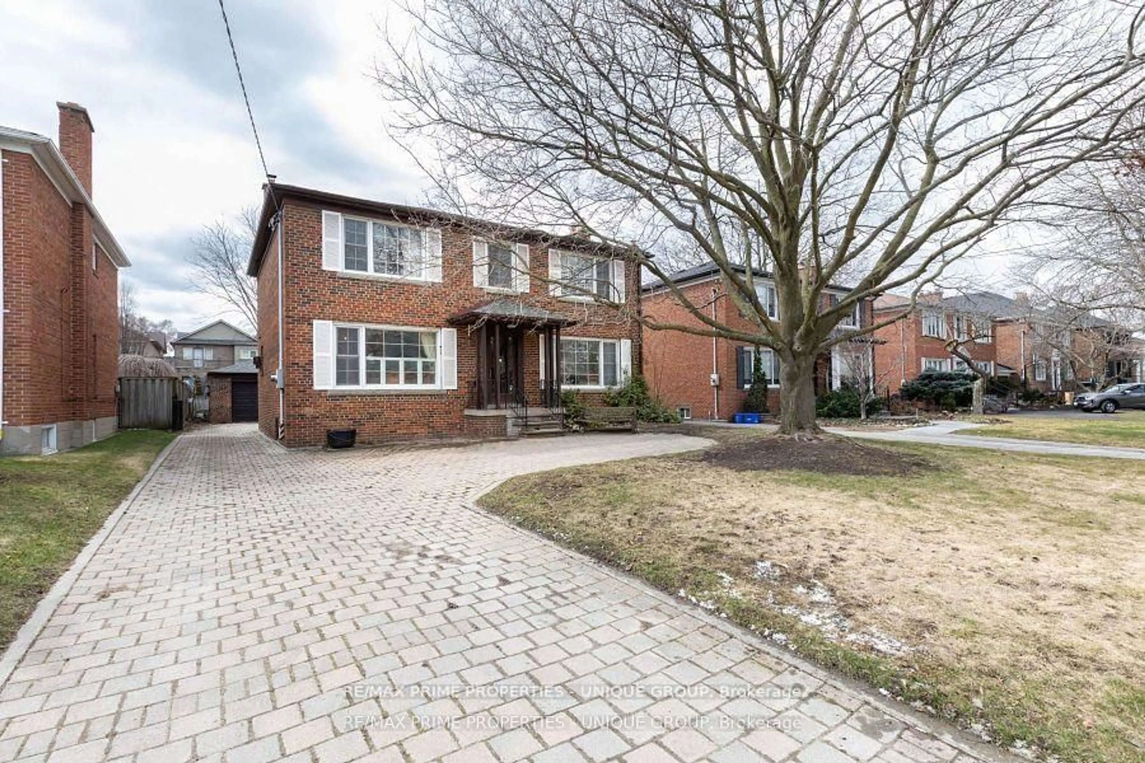 Home with brick exterior material, street for 173 Ridley Blvd, Toronto Ontario M5M 3M4