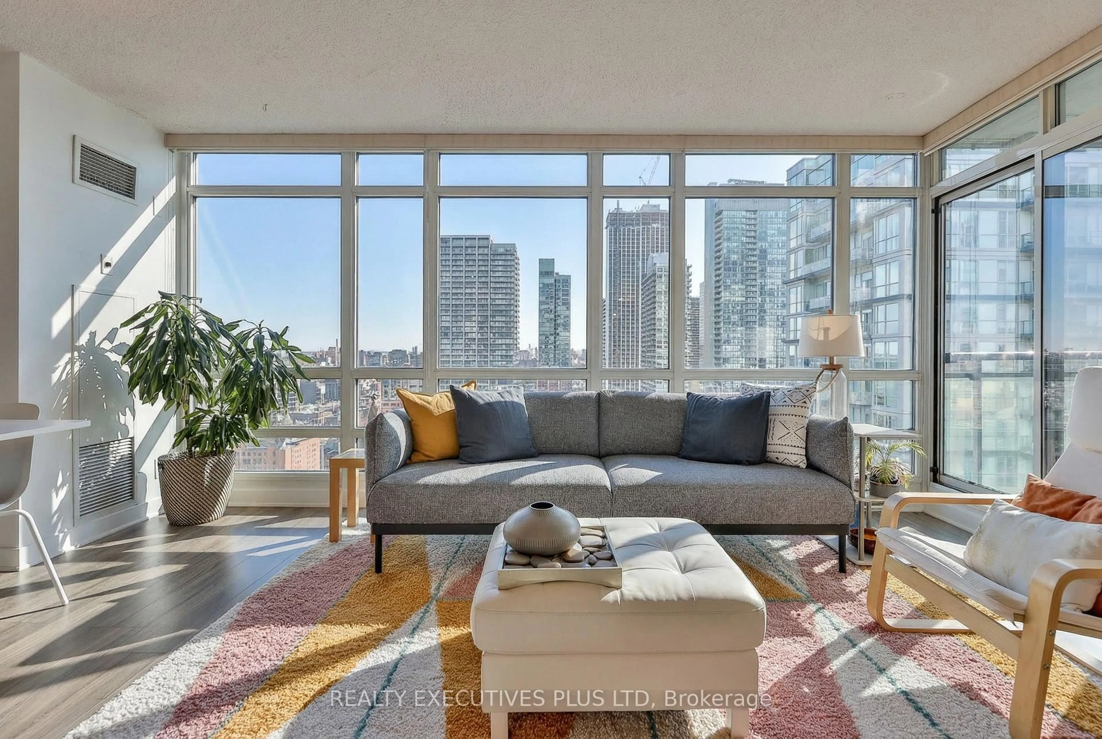 Living room with furniture, unknown for 381 Front St #2703, Toronto Ontario M5V 3R8