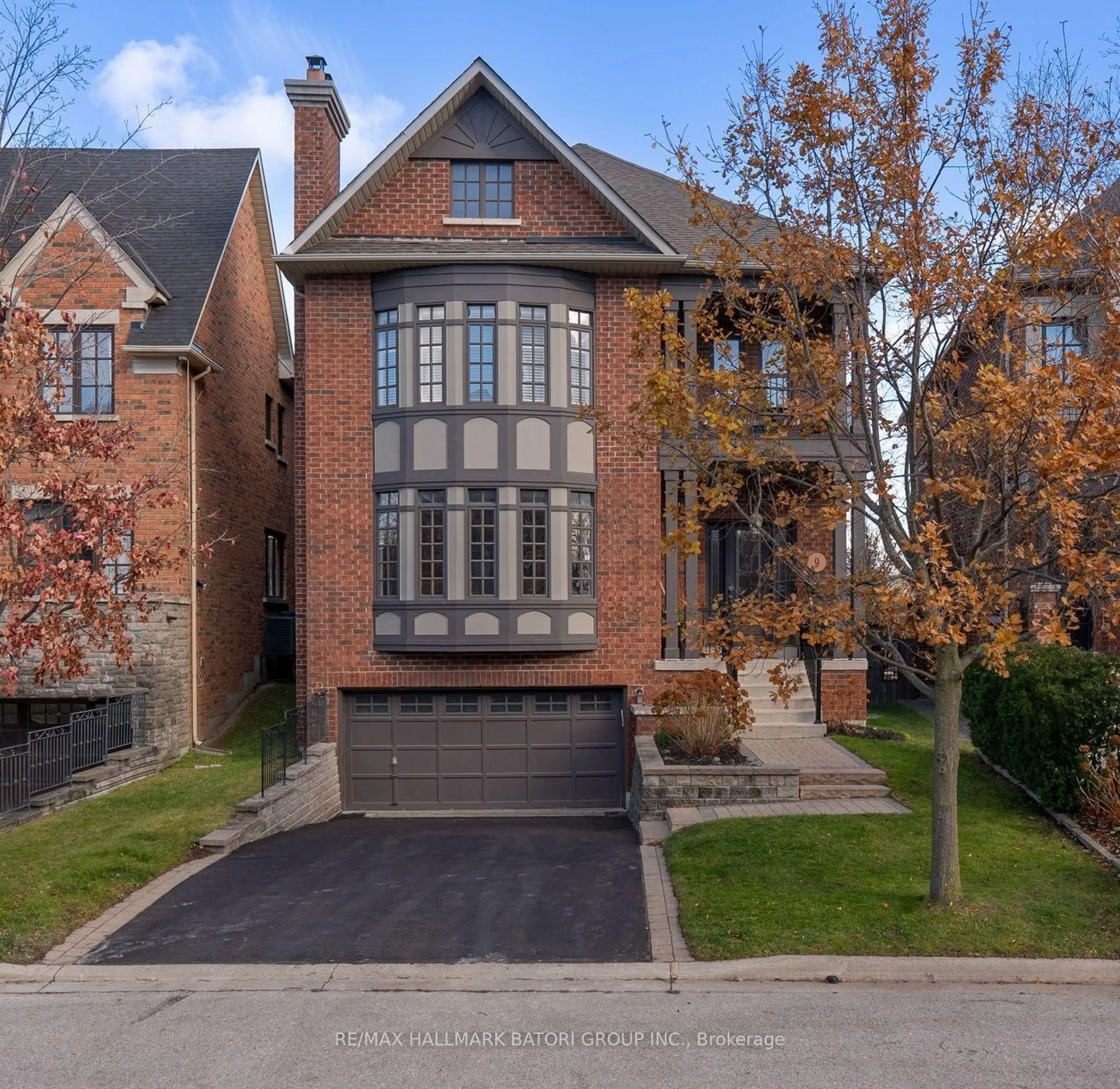 Home with brick exterior material, street for 9 True Davidson Dr, Toronto Ontario M4W 3X2