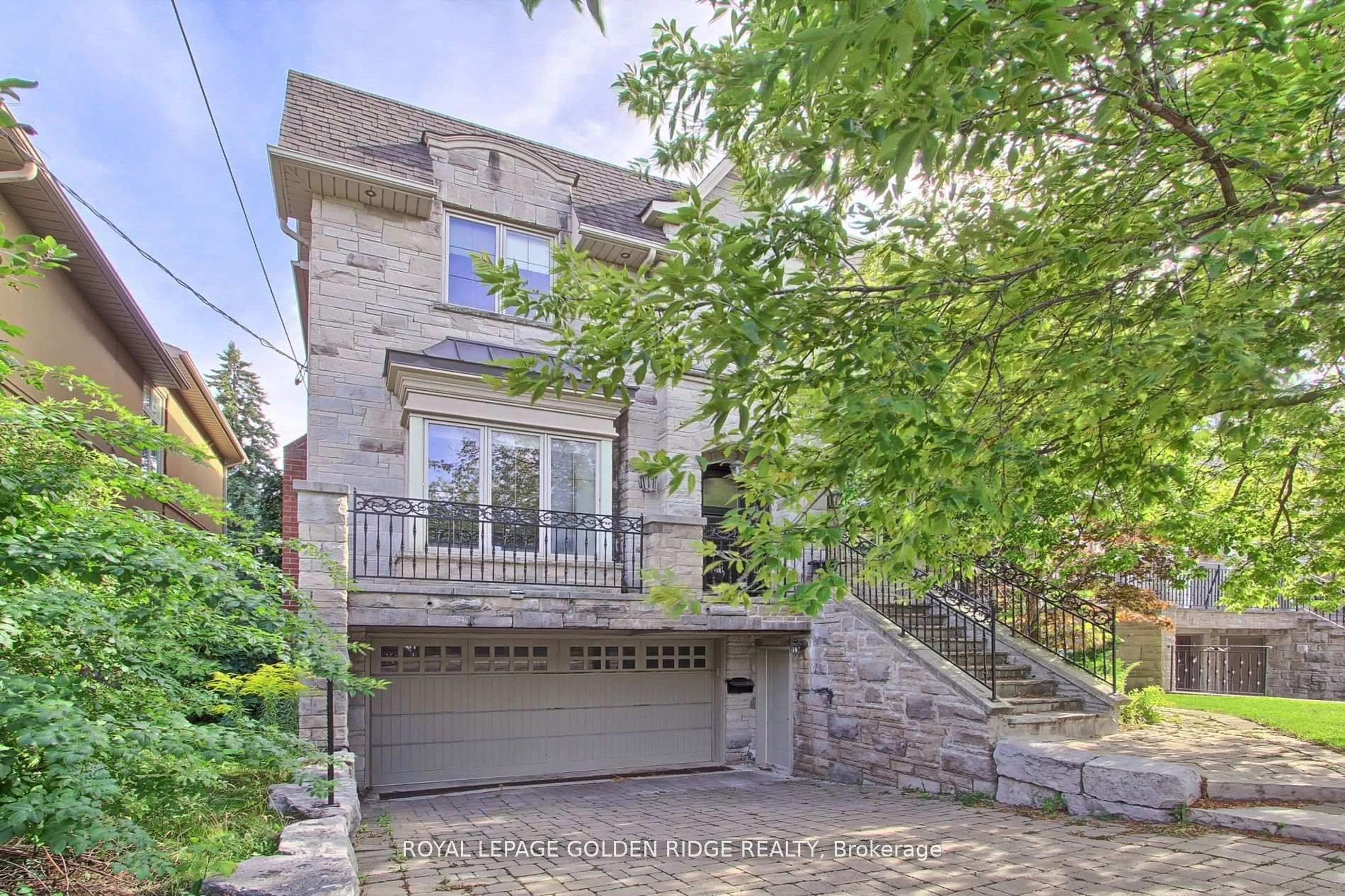 Home with brick exterior material, street for 99 Bannockburn Ave, Toronto Ontario M5M 2M9