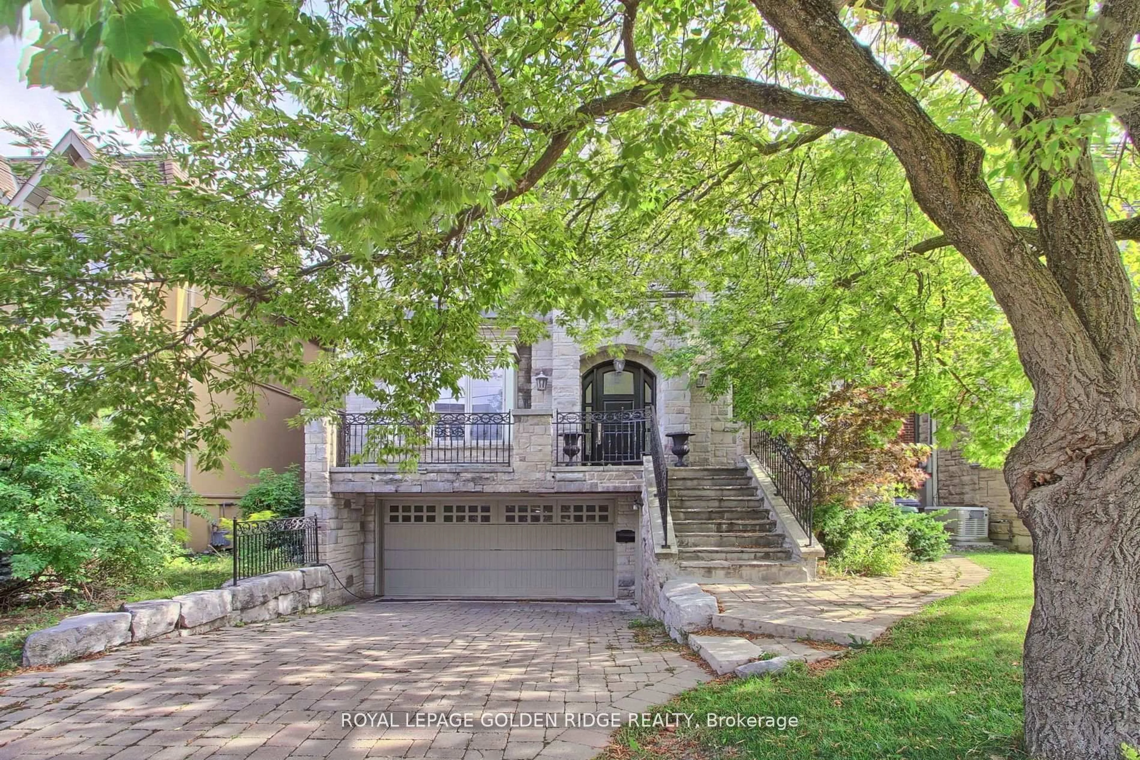 Home with brick exterior material, street for 99 Bannockburn Ave, Toronto Ontario M5M 2M9