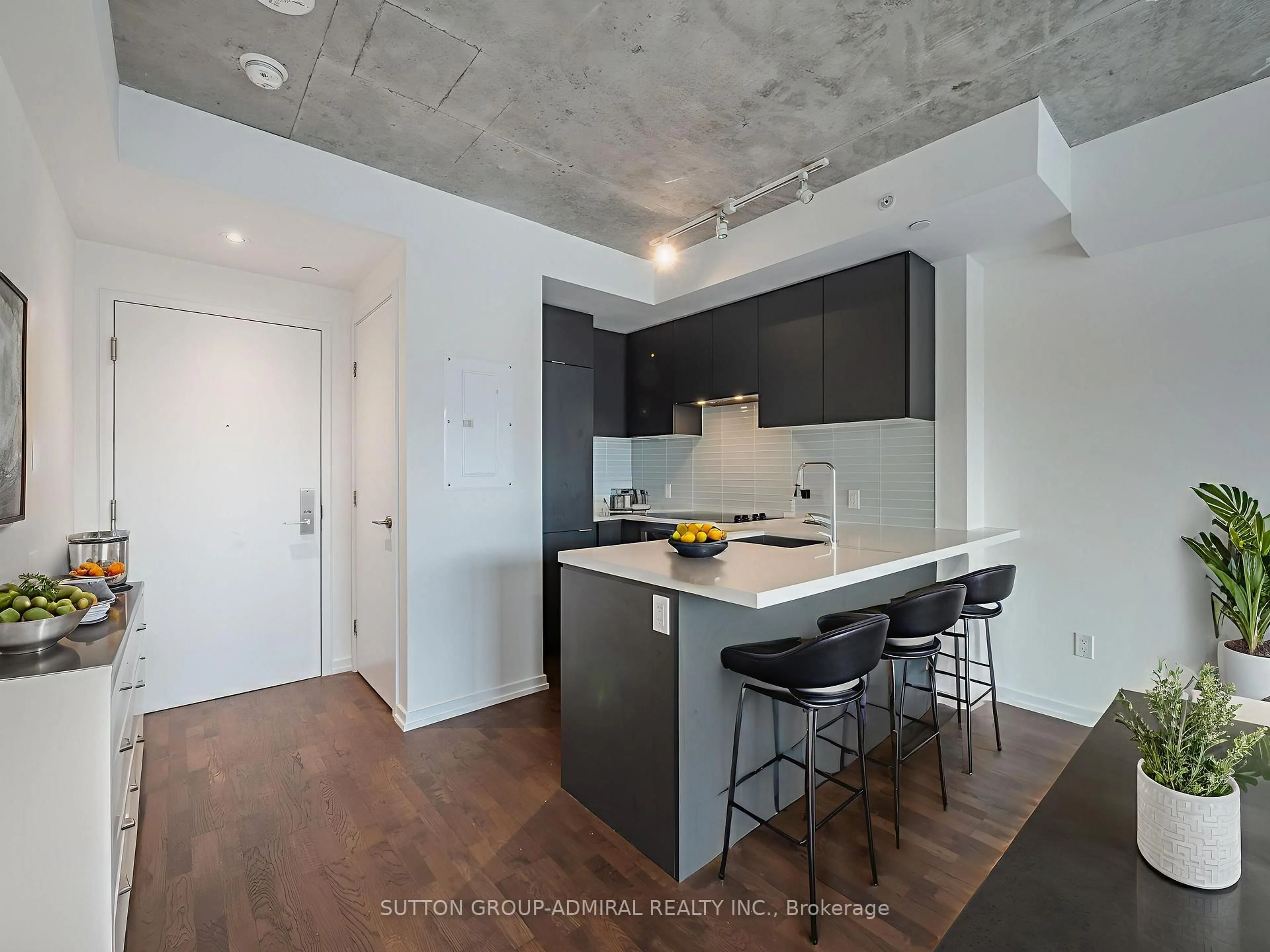 Open concept kitchen, cement floor for 60 Colborne St #704, Toronto Ontario M5E 0B7