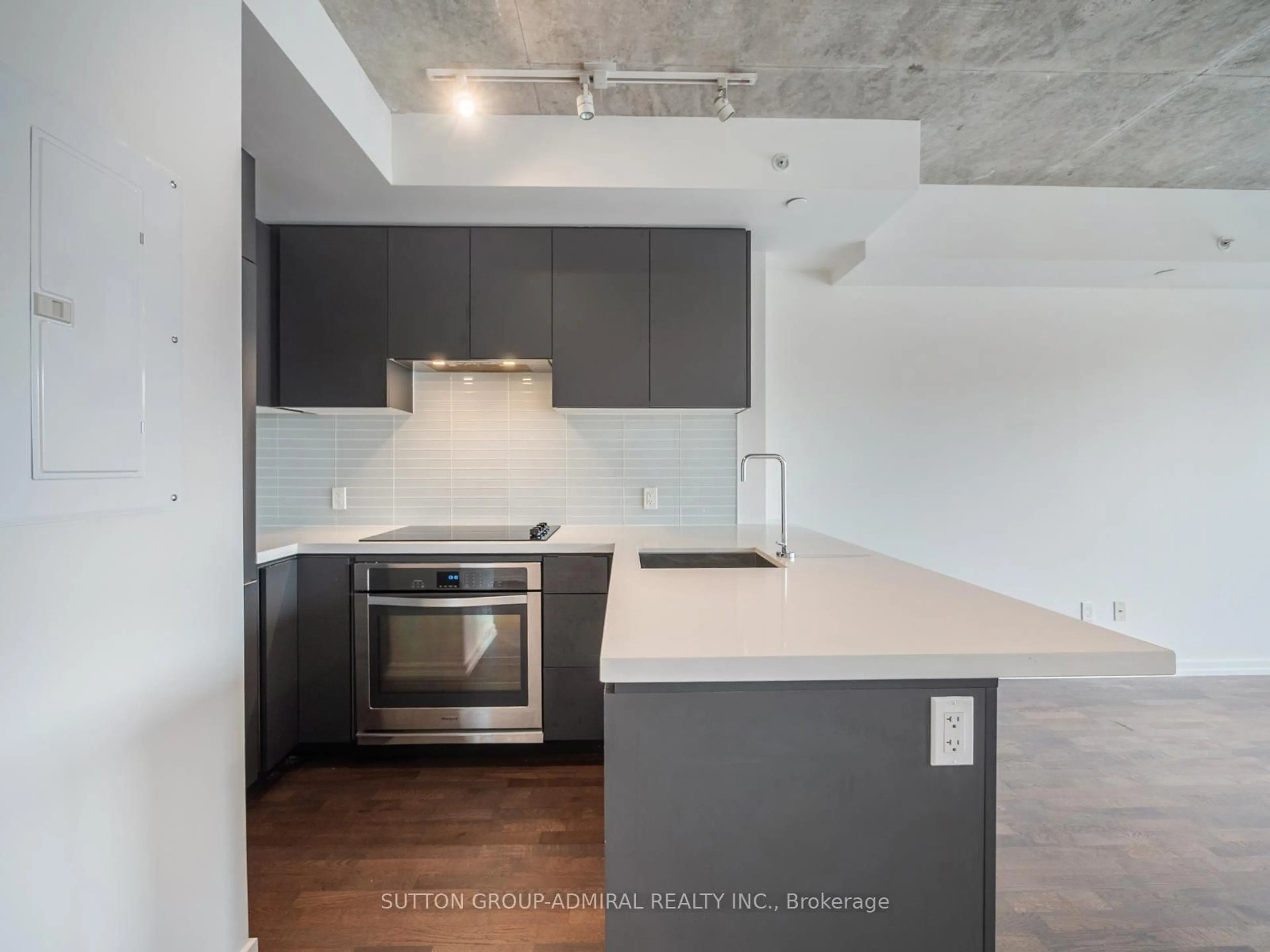 Open concept kitchen, cement floor for 60 Colborne St #704, Toronto Ontario M5E 0B7