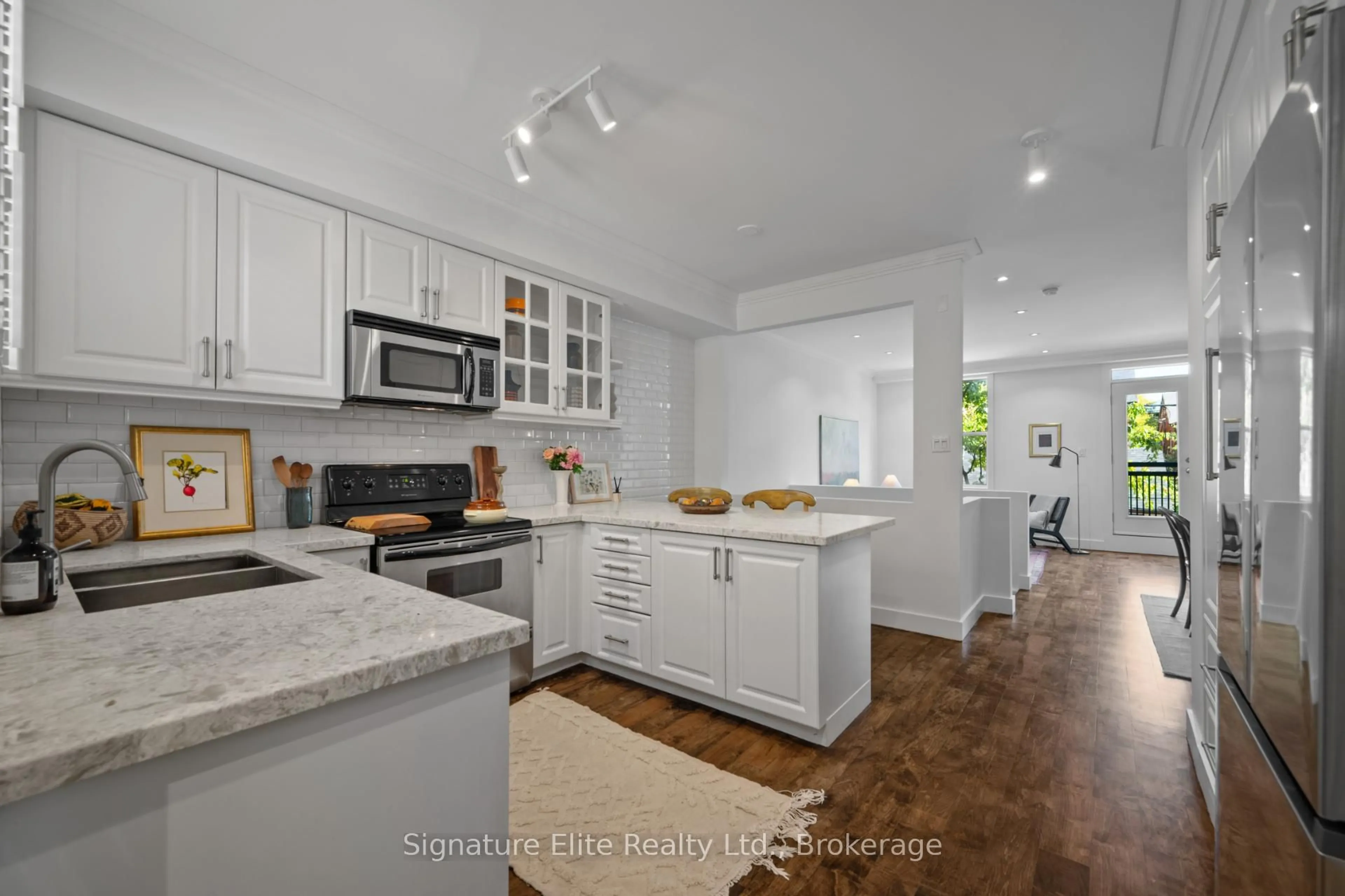 Open concept kitchen, ceramic/tile floor for 51 Halton St #123, Toronto Ontario M6J 1R5