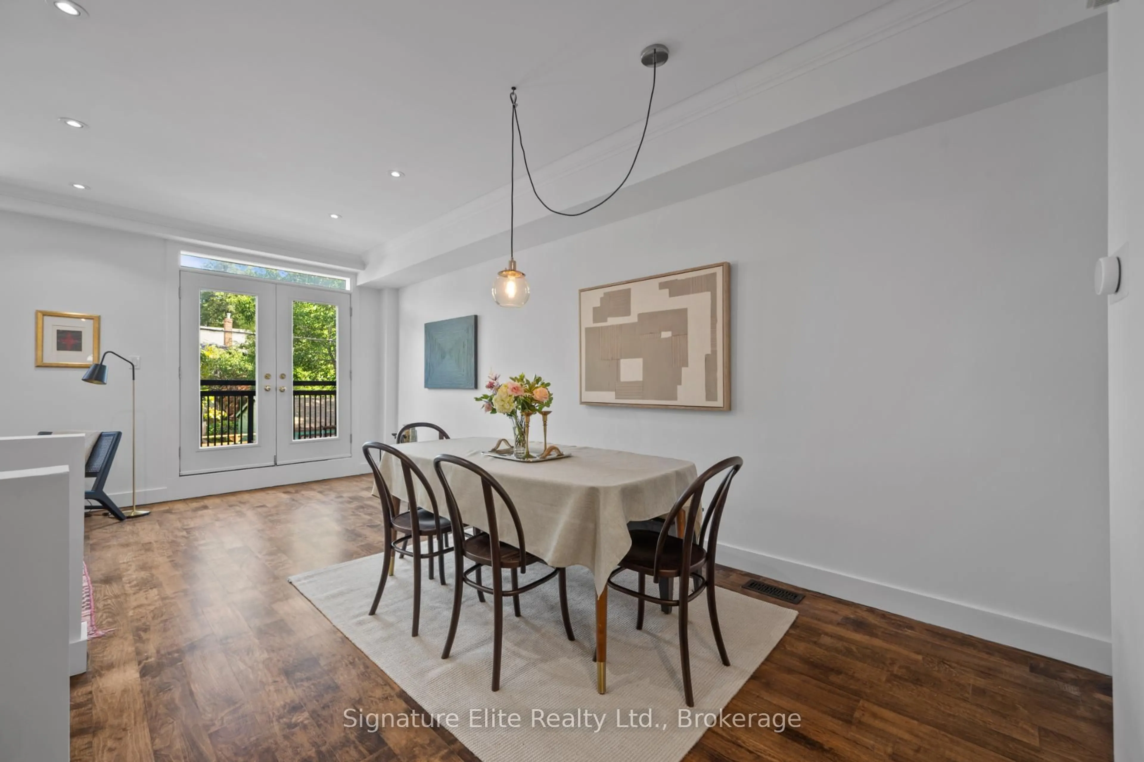 Dining room, wood/laminate floor for 51 Halton St #123, Toronto Ontario M6J 1R5