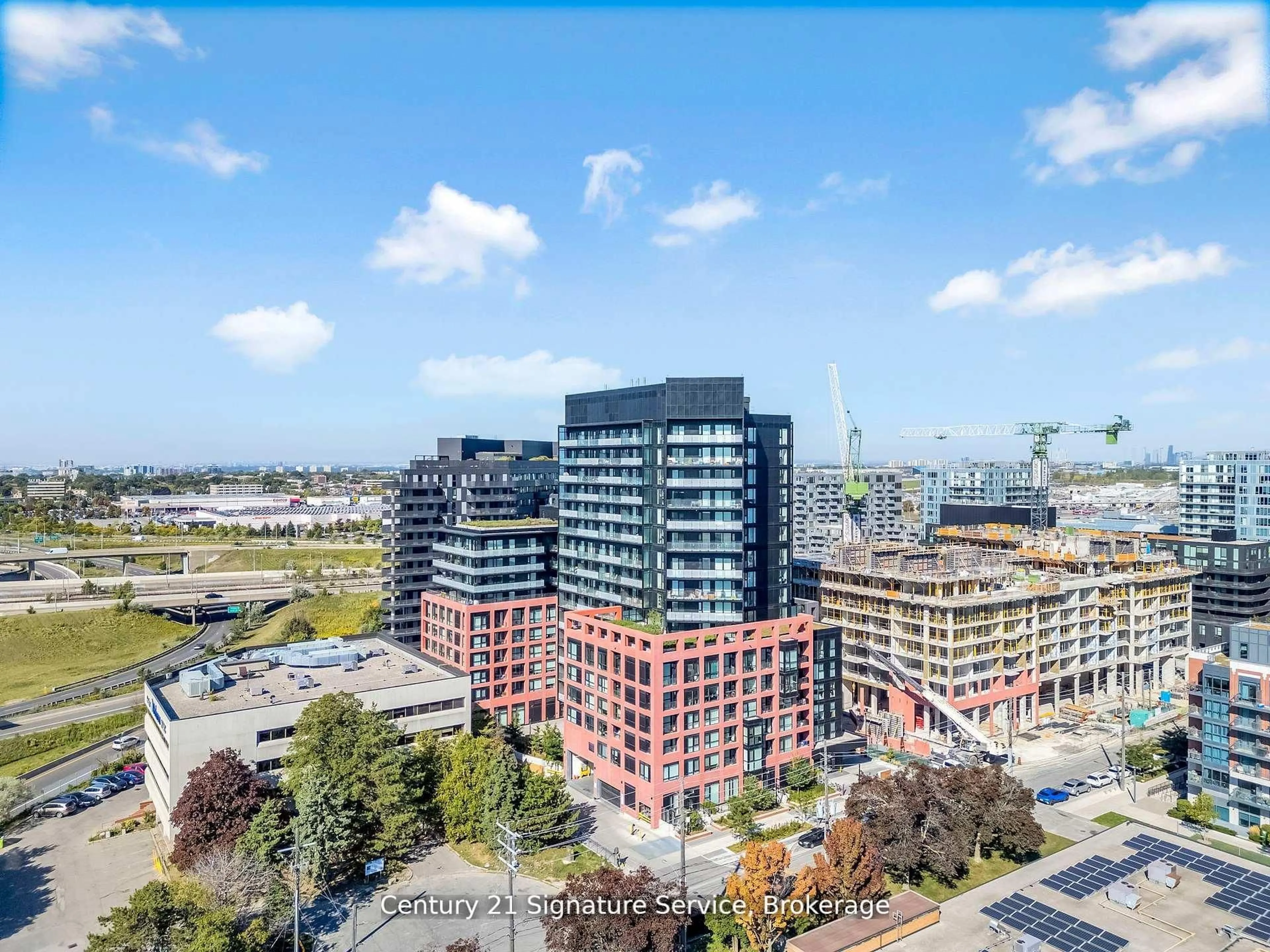 A pic from outside/outdoor area/front of a property/back of a property/a pic from drone, city buildings view from balcony for 8 Tippett Rd #803, Toronto Ontario M3H 0E7