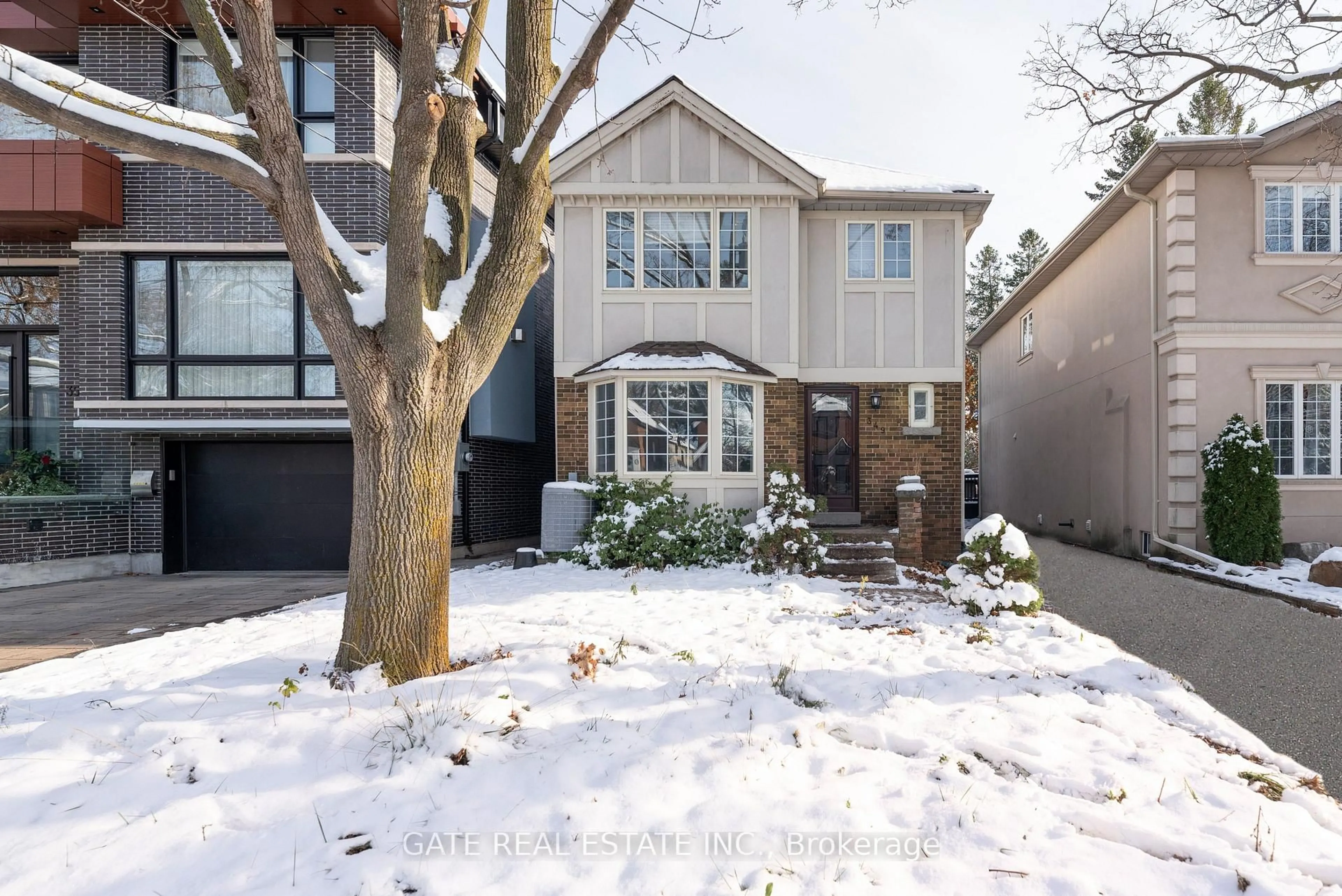 Home with brick exterior material, street for 349 Laird Dr, Toronto Ontario M4G 3Y1