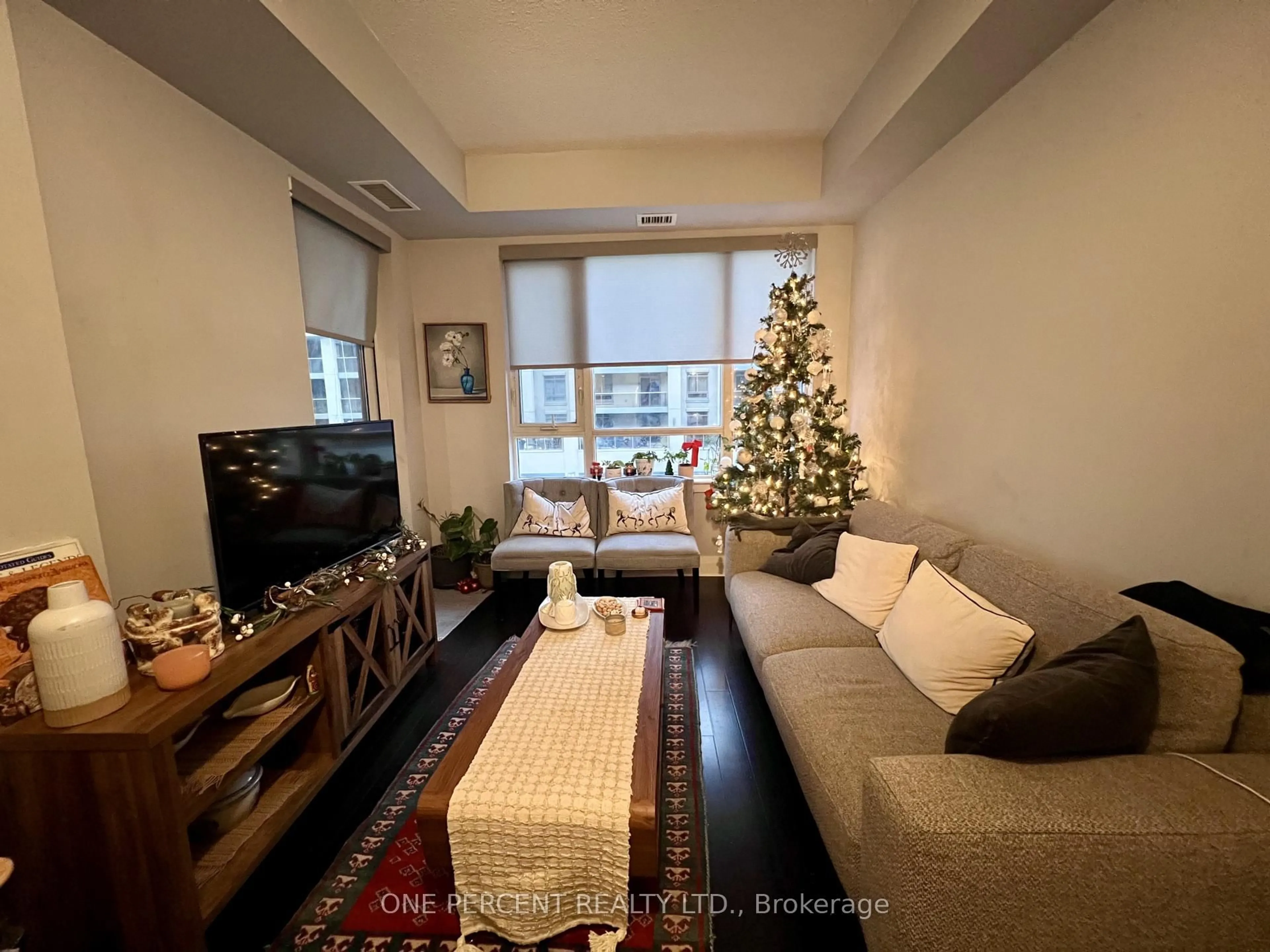 Living room with furniture, floor is not visible for 17 Kenaston Gdns #311, Toronto Ontario M2K 0B9