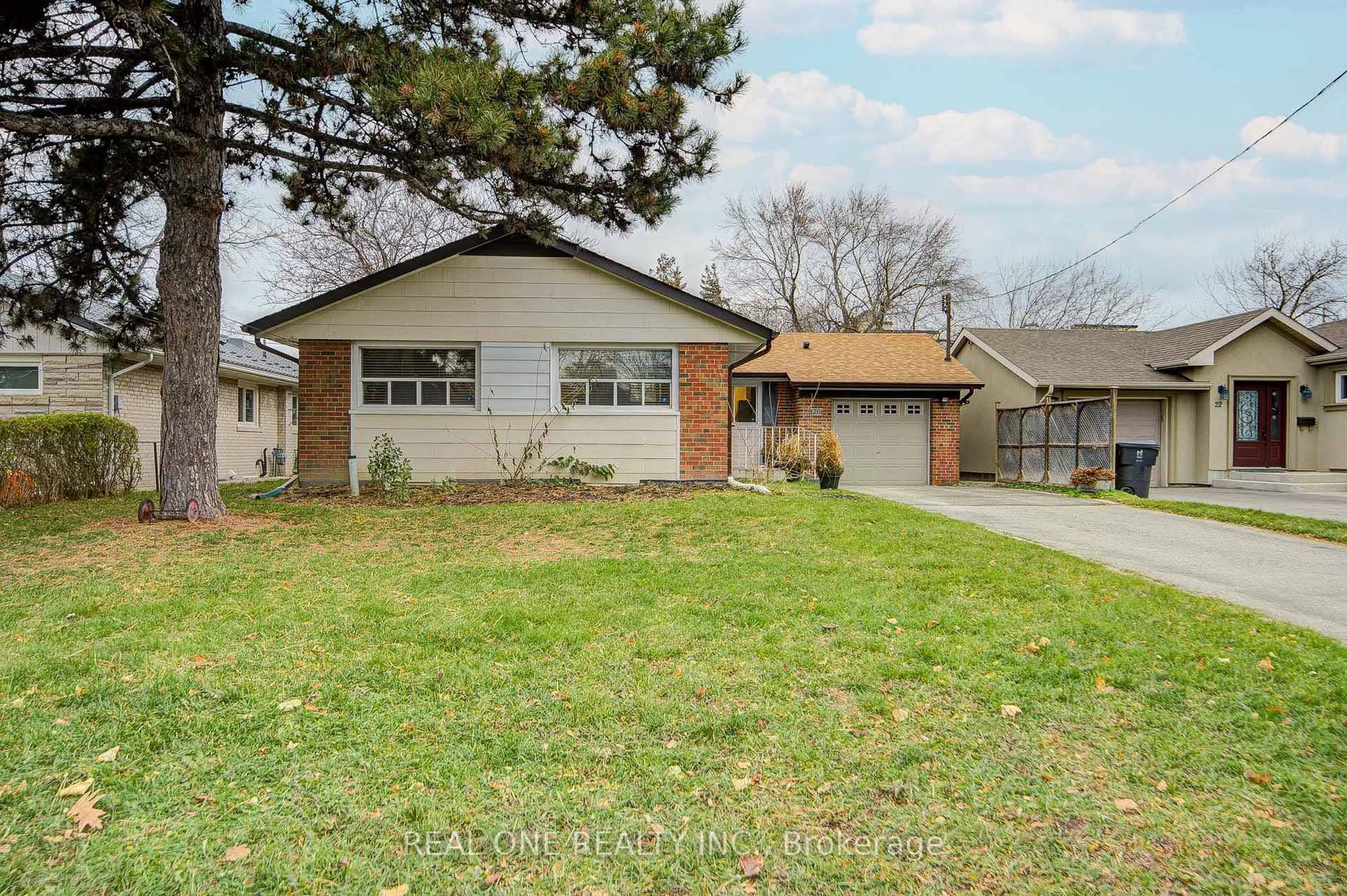 Home with brick exterior material, street for 26 ELVASTON Dr, Toronto Ontario M4A 1M9