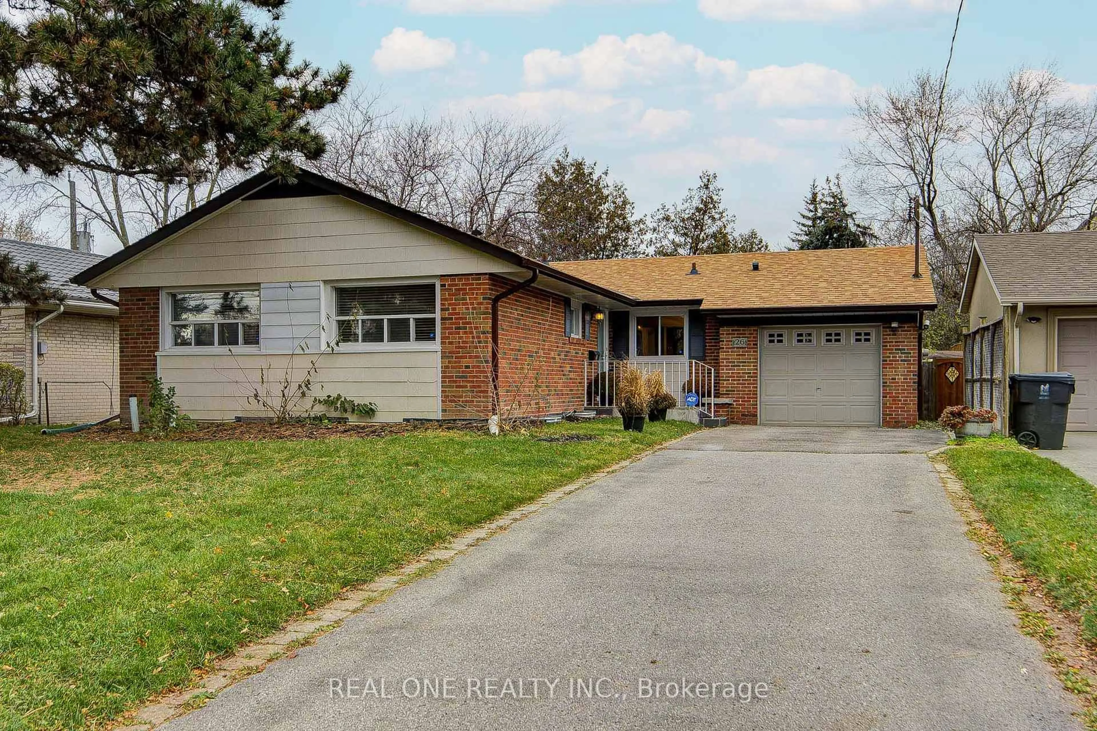 Home with brick exterior material, street for 26 ELVASTON Dr, Toronto Ontario M4A 1M9