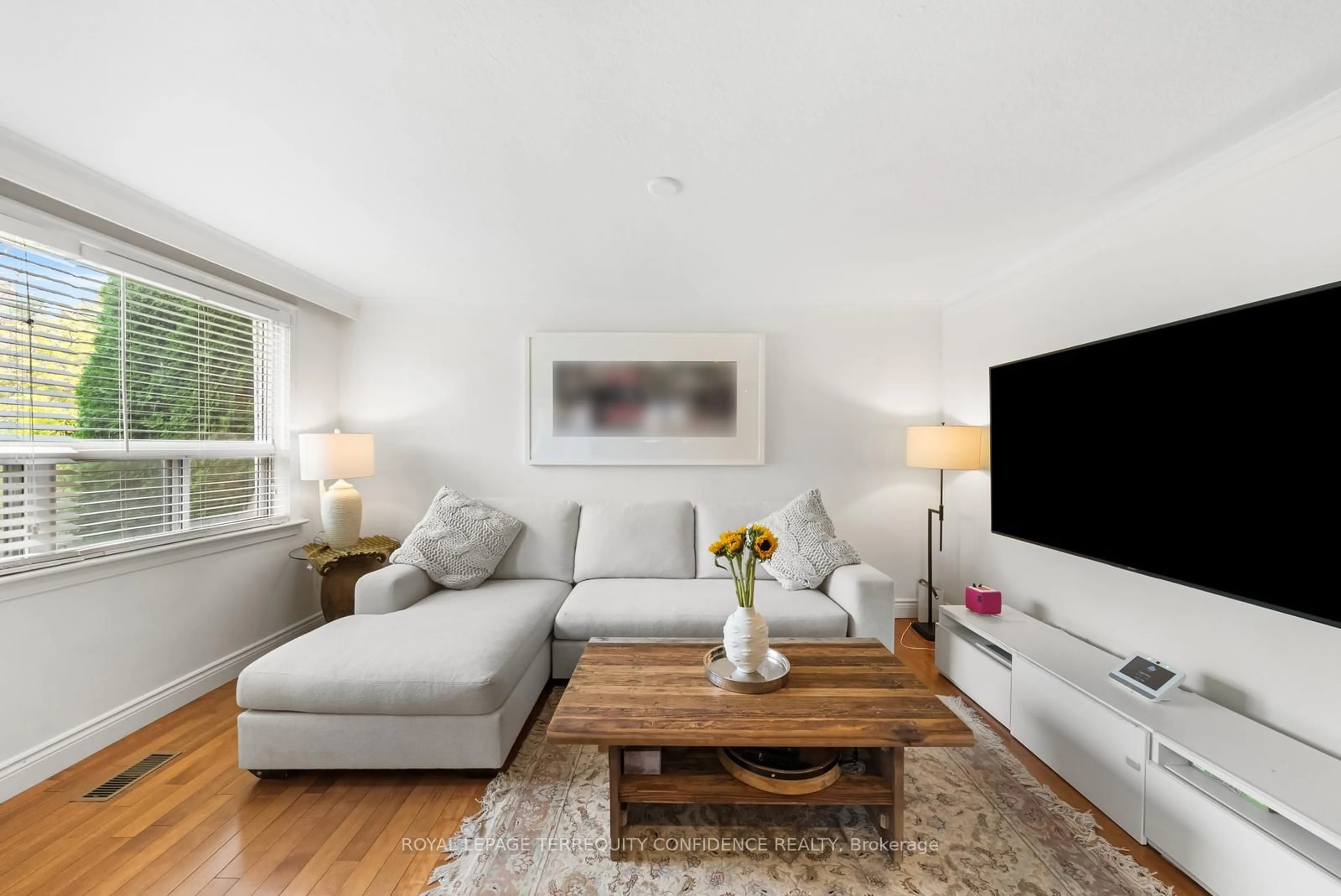 Living room with furniture, wood/laminate floor for 69 Nipigon Ave, Toronto Ontario M2M 2V9