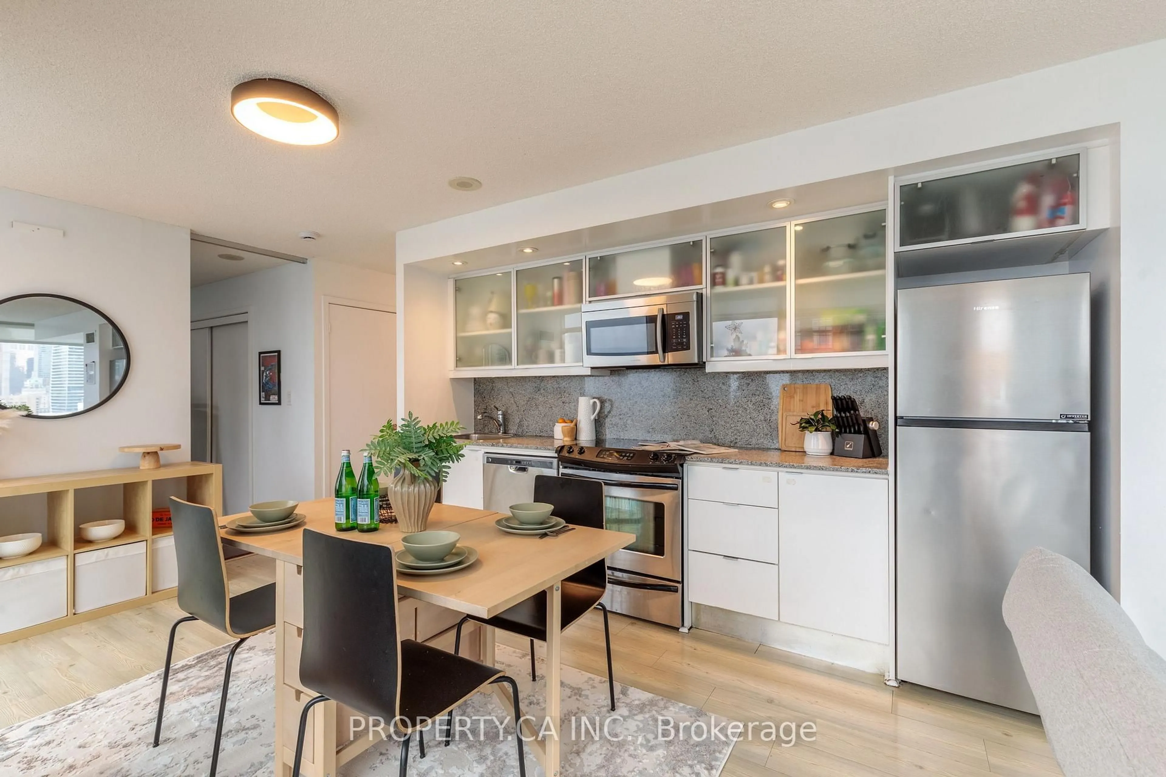 Open concept kitchen, unknown for 25 Telegram Mews #3606, Toronto Ontario M5V 3Z1