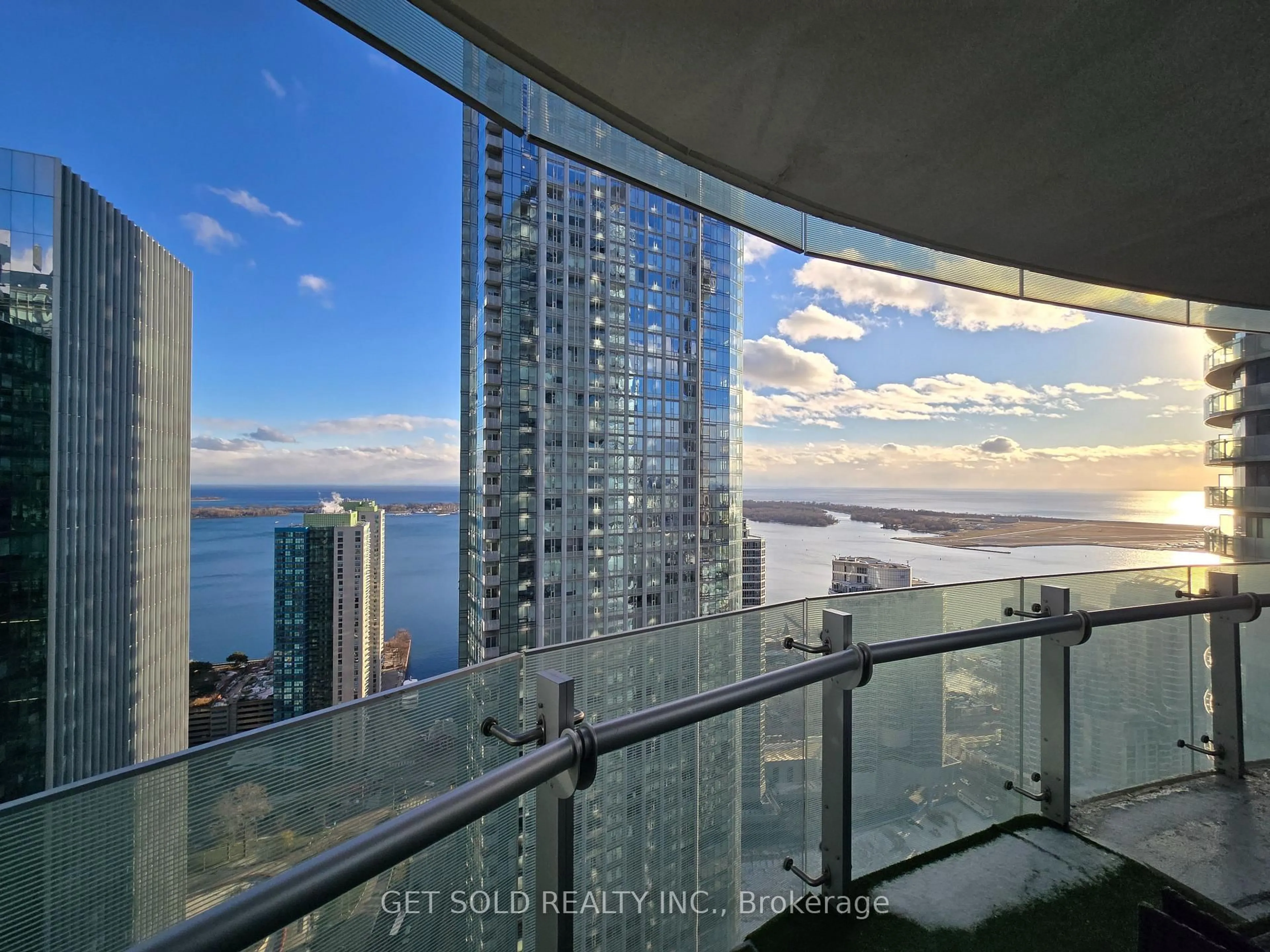 Balcony in the apartment, city buildings view from balcony for 14 York St #3803, Toronto Ontario M5J 0B1