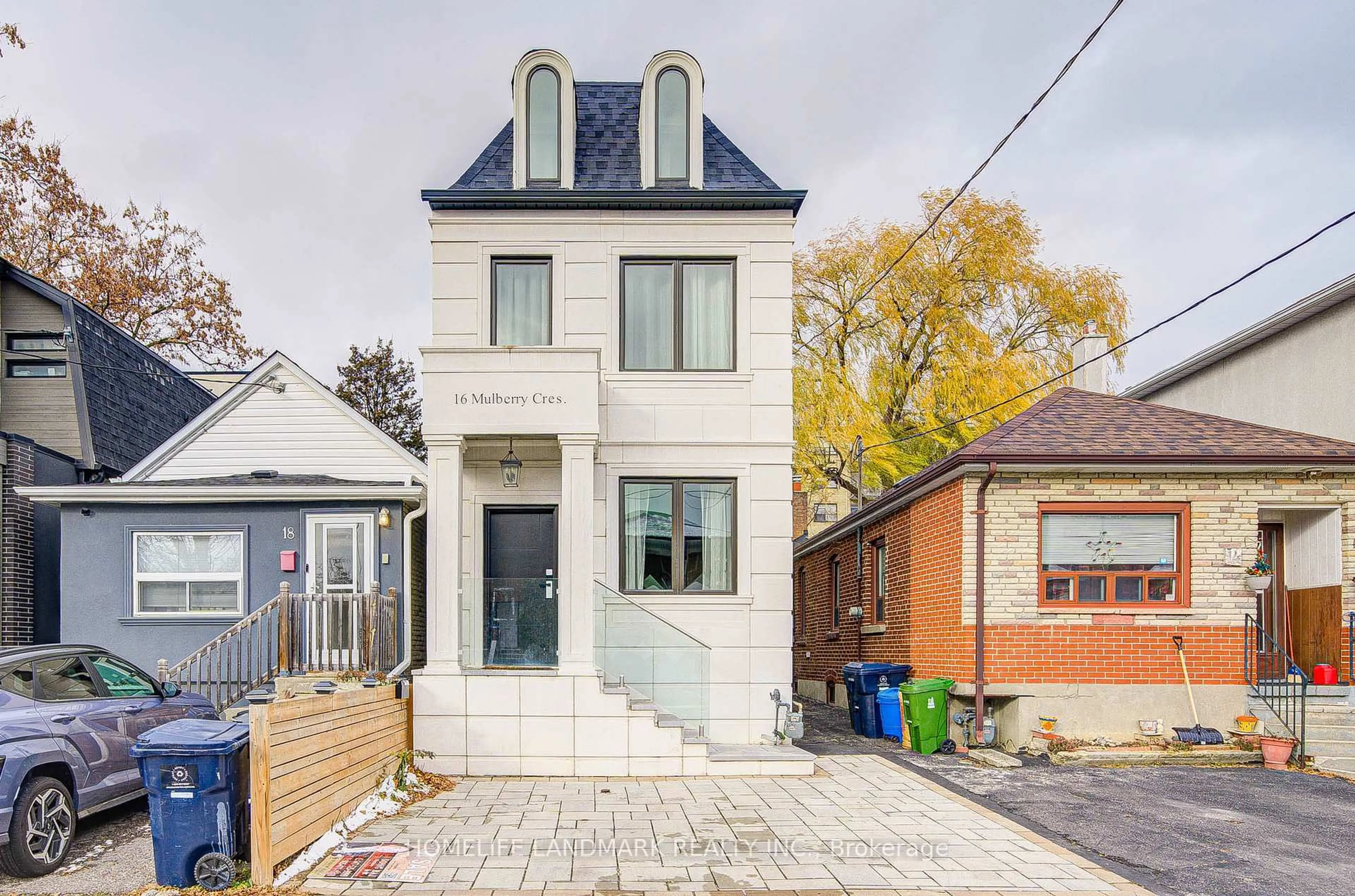 Home with brick exterior material, street for 16 Mulberry Cres, Toronto Ontario M6C 1N5