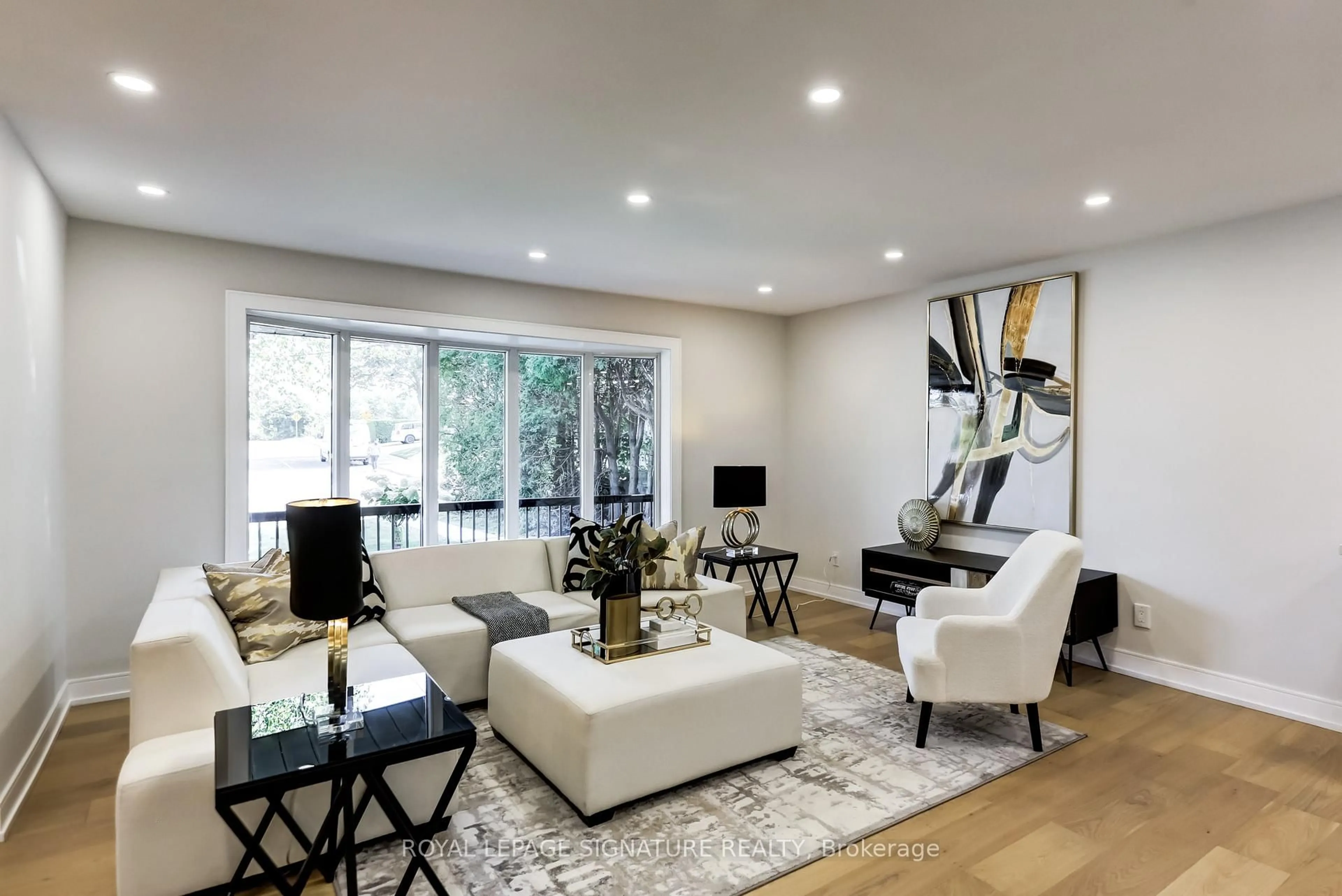 Living room with furniture, wood/laminate floor for 30 Snowcrest Ave, Toronto Ontario M2K 2K7