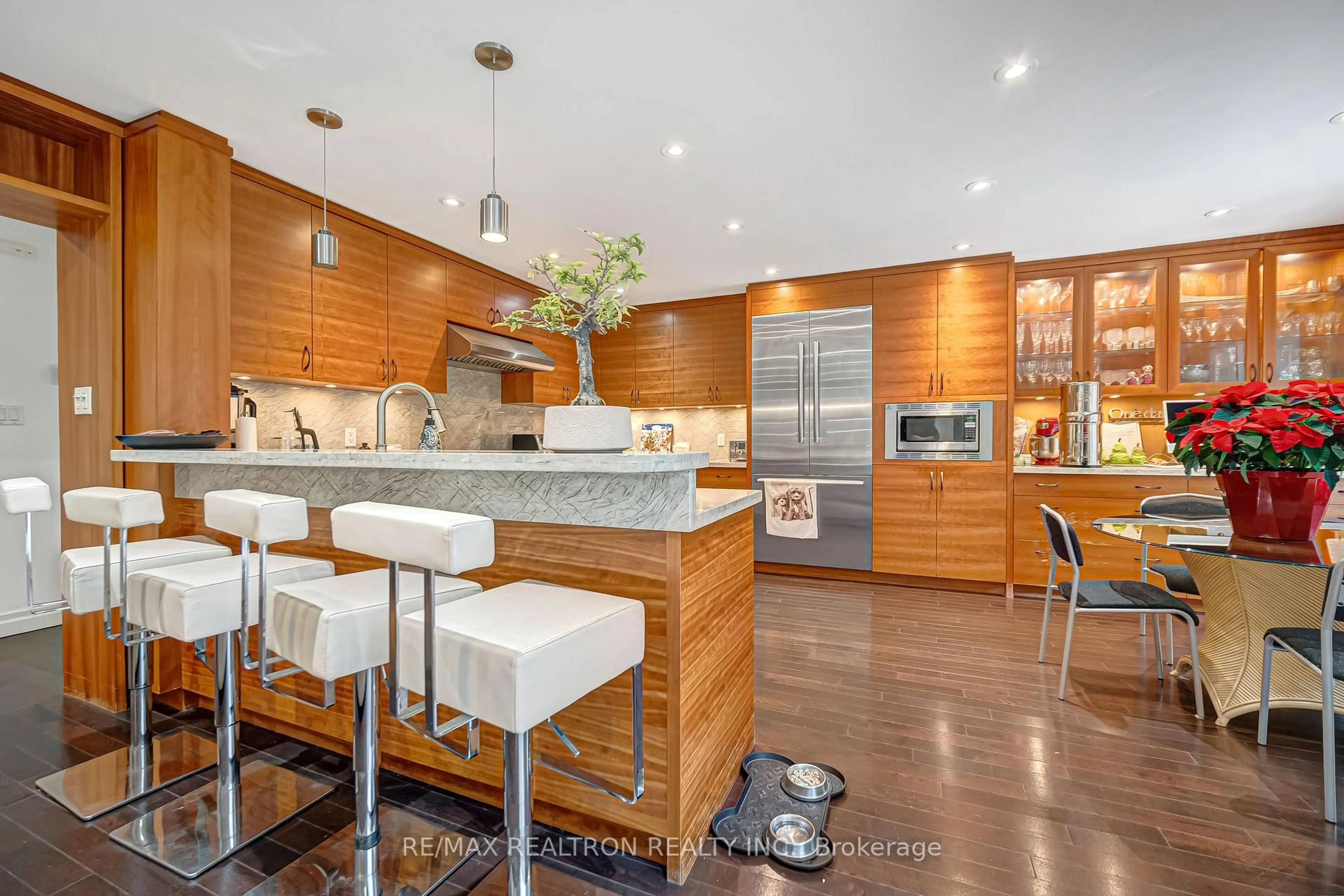 Contemporary kitchen, wood/laminate floor for 42 Apollo Dr, Toronto Ontario M3B 2G8