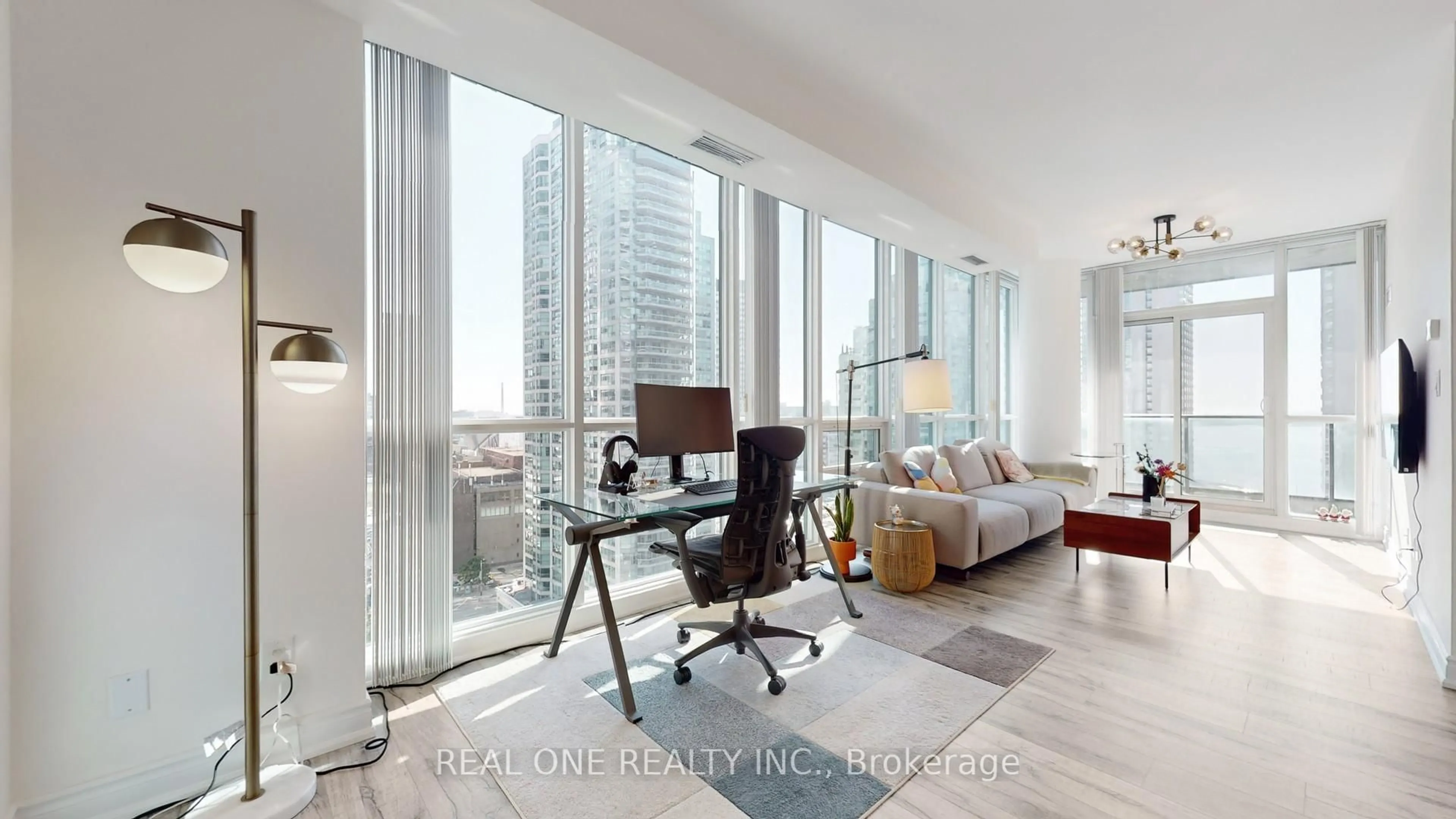 Living room with furniture, wood/laminate floor for 33 Bay St #1708, Toronto Ontario M5J 2Z3
