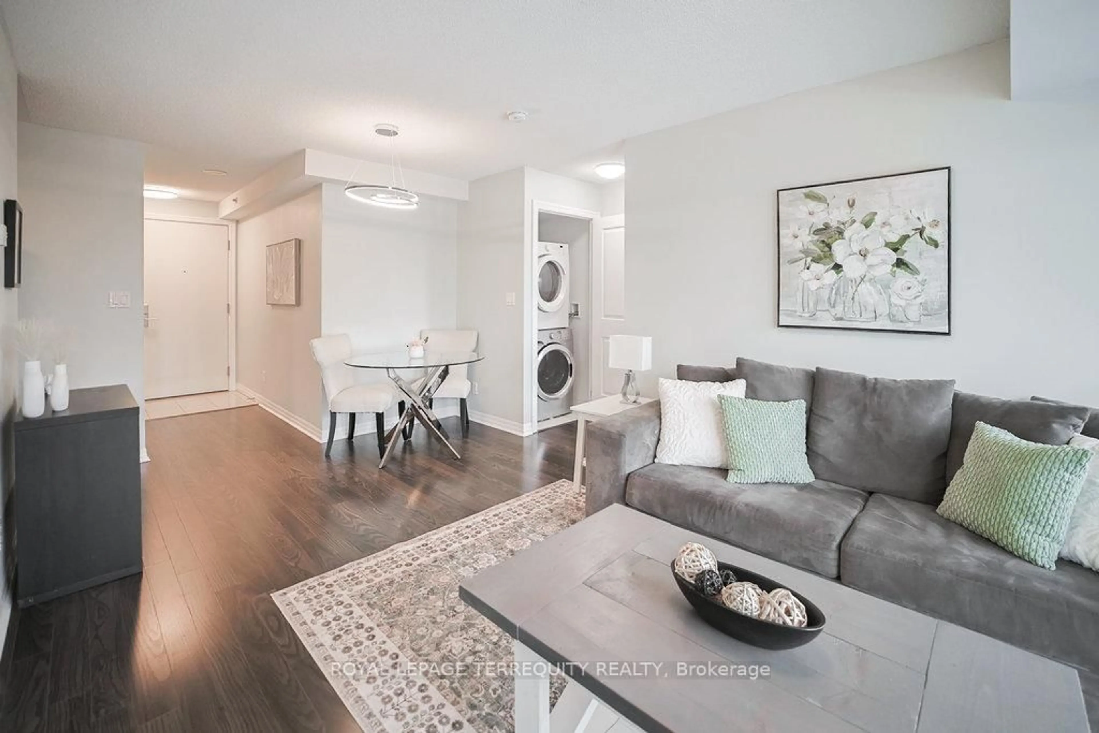 Living room with furniture, wood/laminate floor for 275 Yorkland Rd #411, Toronto Ontario M2J 0B4