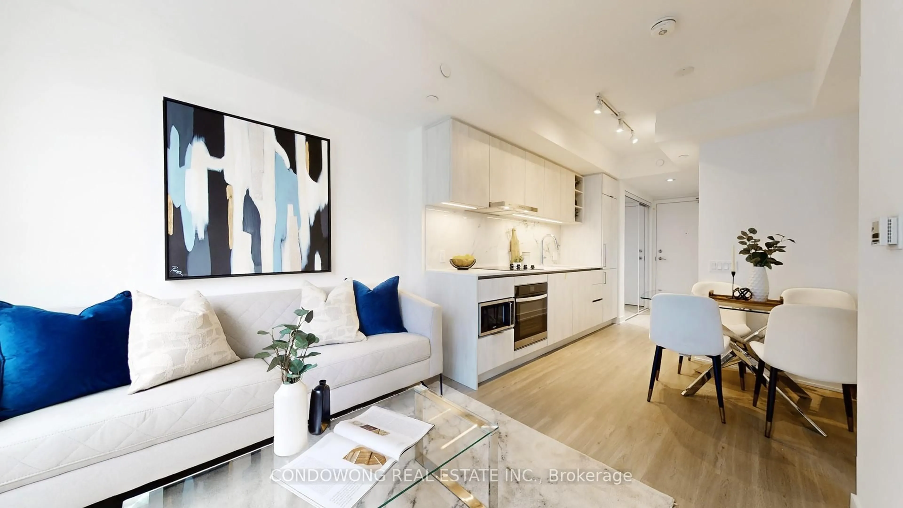 Living room with furniture, wood/laminate floor for 8 Wellesley St #1801, Toronto Ontario M4Y 0J5