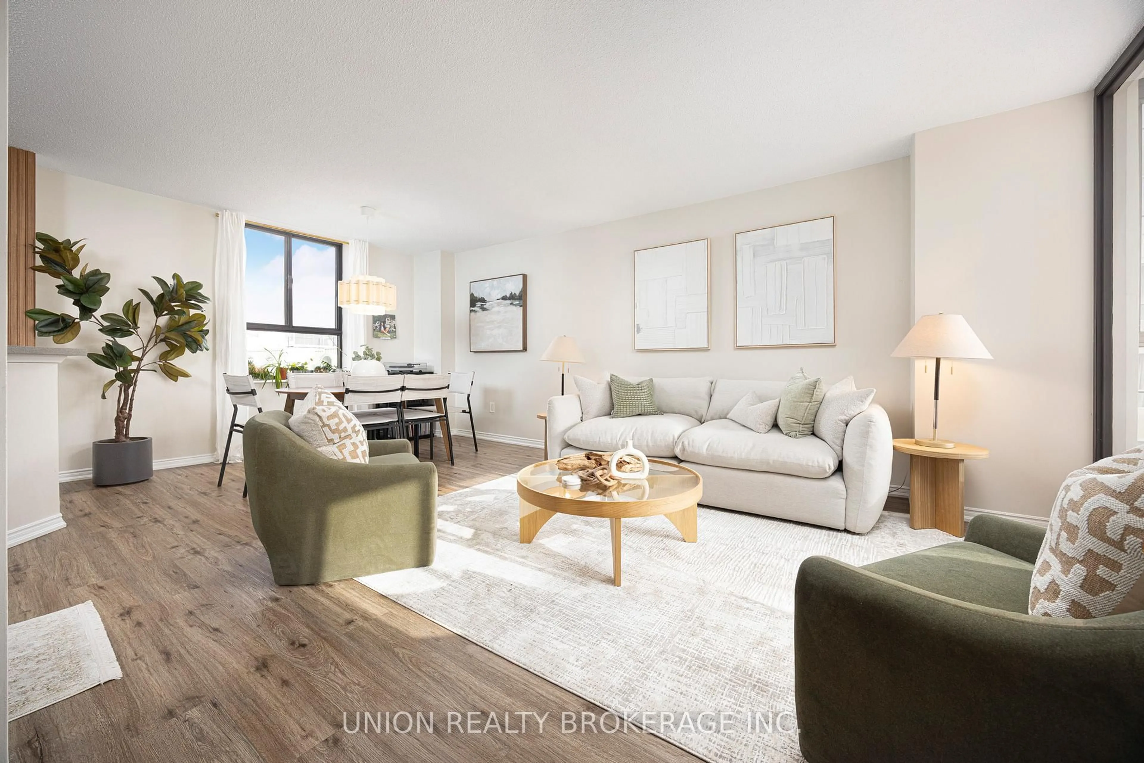 Living room with furniture, wood/laminate floor for 95 Lombard St #1201, Toronto Ontario M5C 2V3