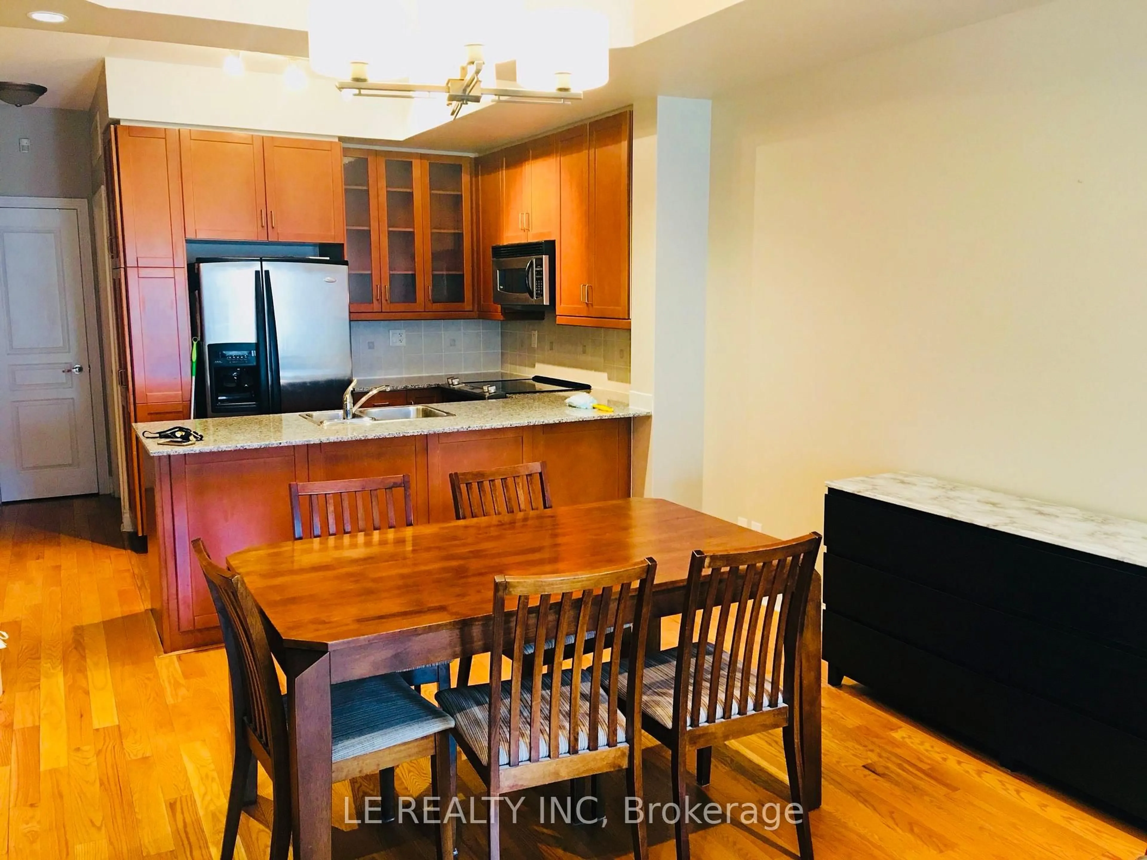 Open concept kitchen, wood/laminate floor for 70 Byng Ave #26, Toronto Ontario M2N 7L9