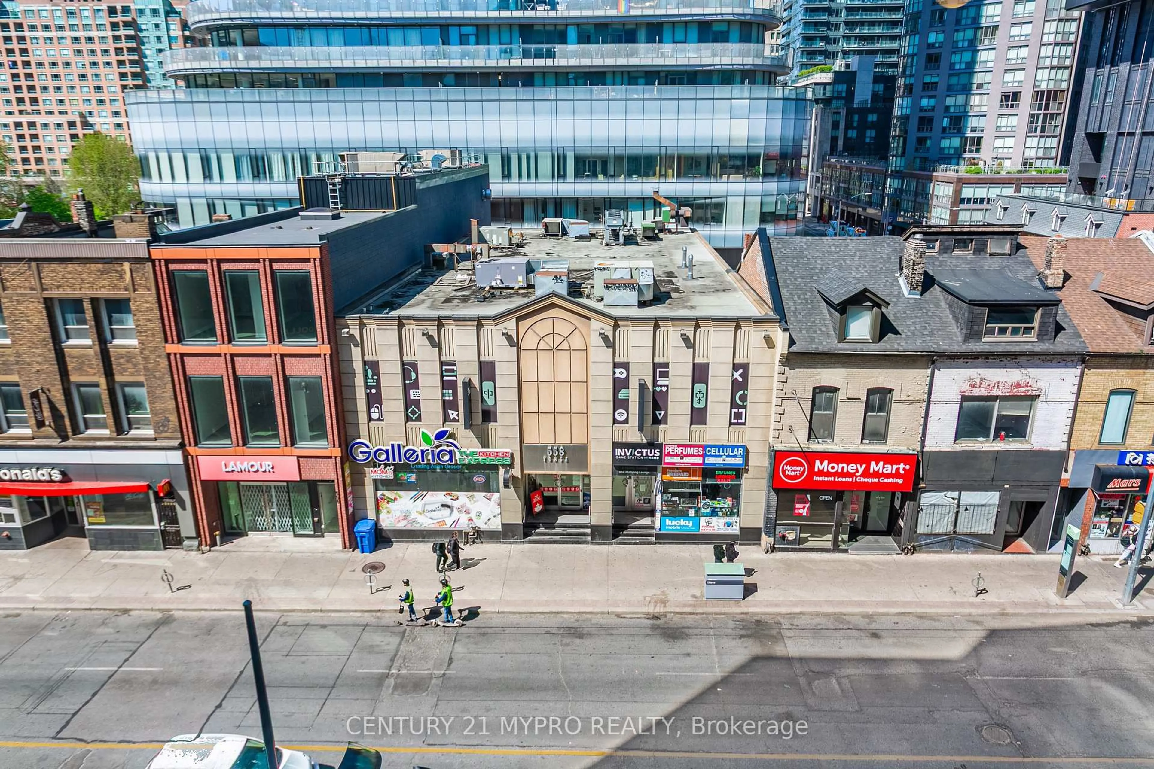 A pic from outside/outdoor area/front of a property/back of a property/a pic from drone, city buildings view from balcony for 555 Yonge St #401, Toronto Ontario M4Y 3A6