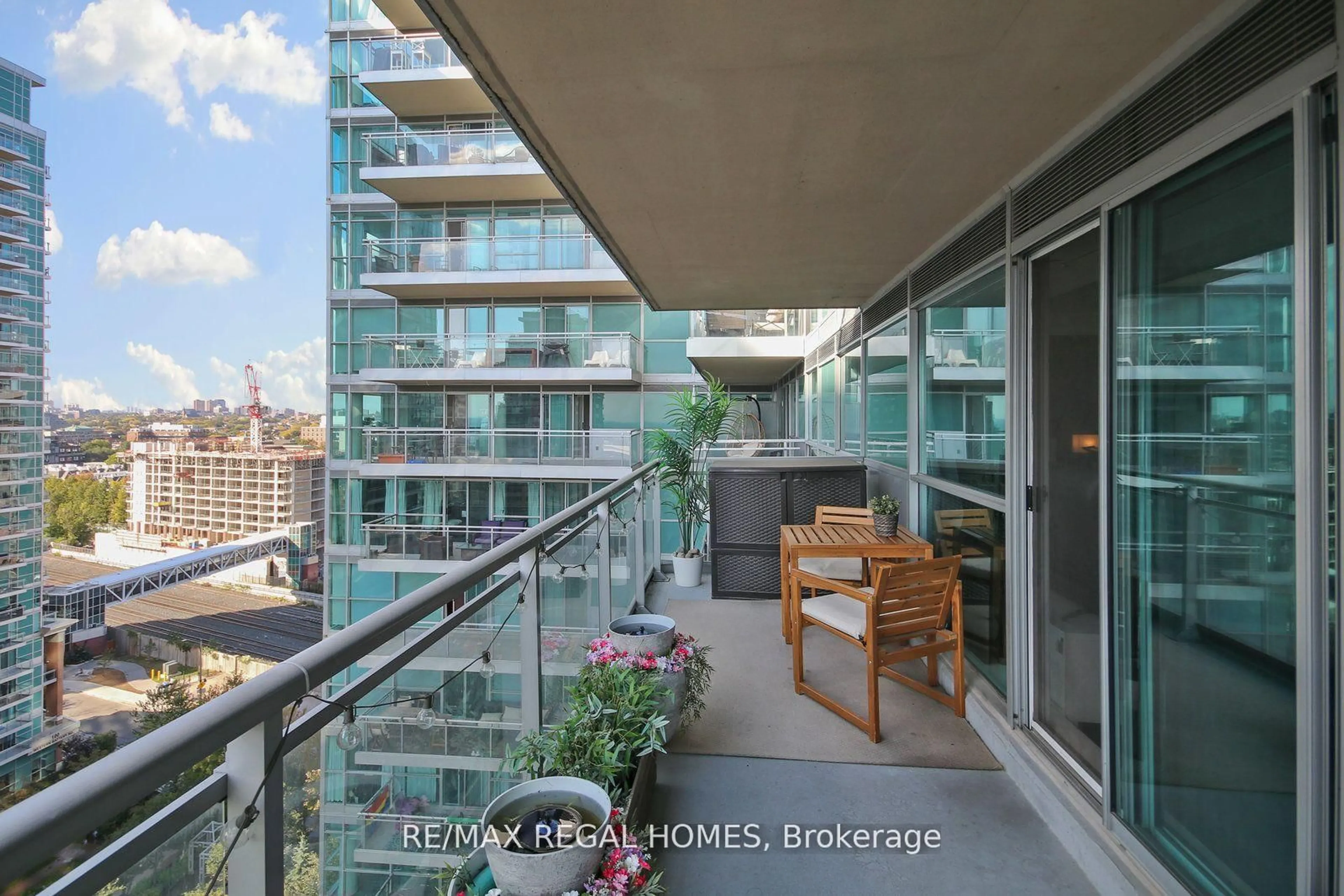 Balcony in the apartment, city buildings view from balcony for 80 Western Battery Rd #1512, Toronto Ontario M6K 3S1
