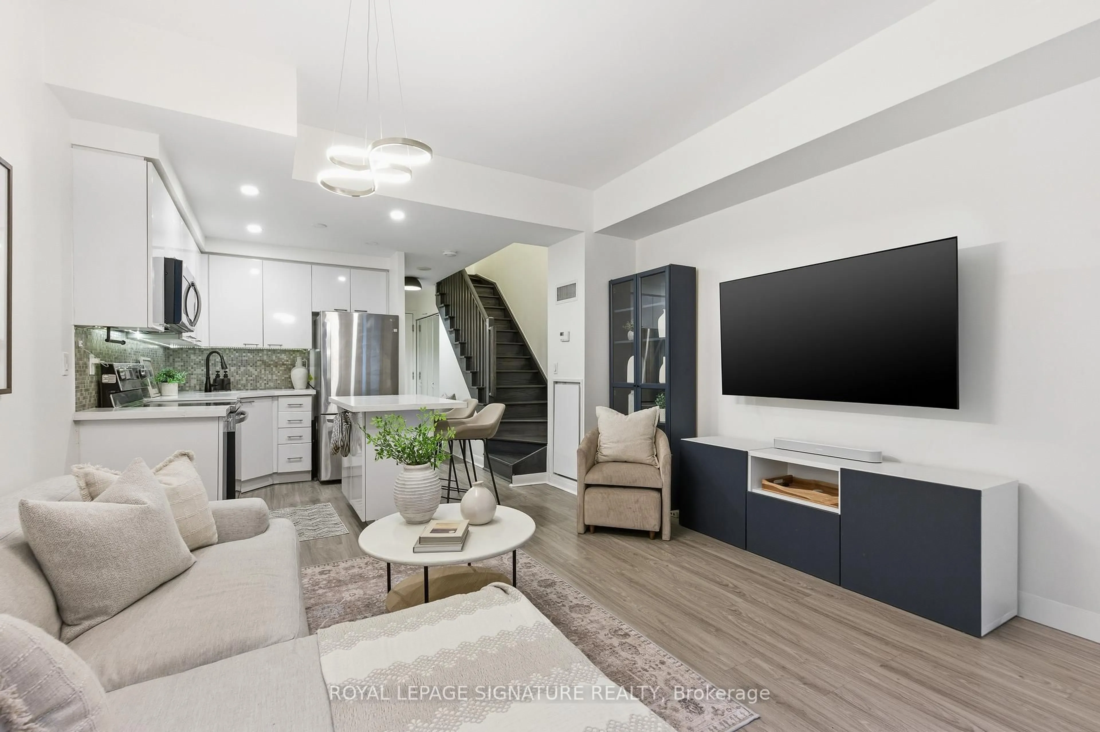 Living room with furniture, unknown for 15 Bruyeres Mews #105, Toronto Ontario M5V 0A7