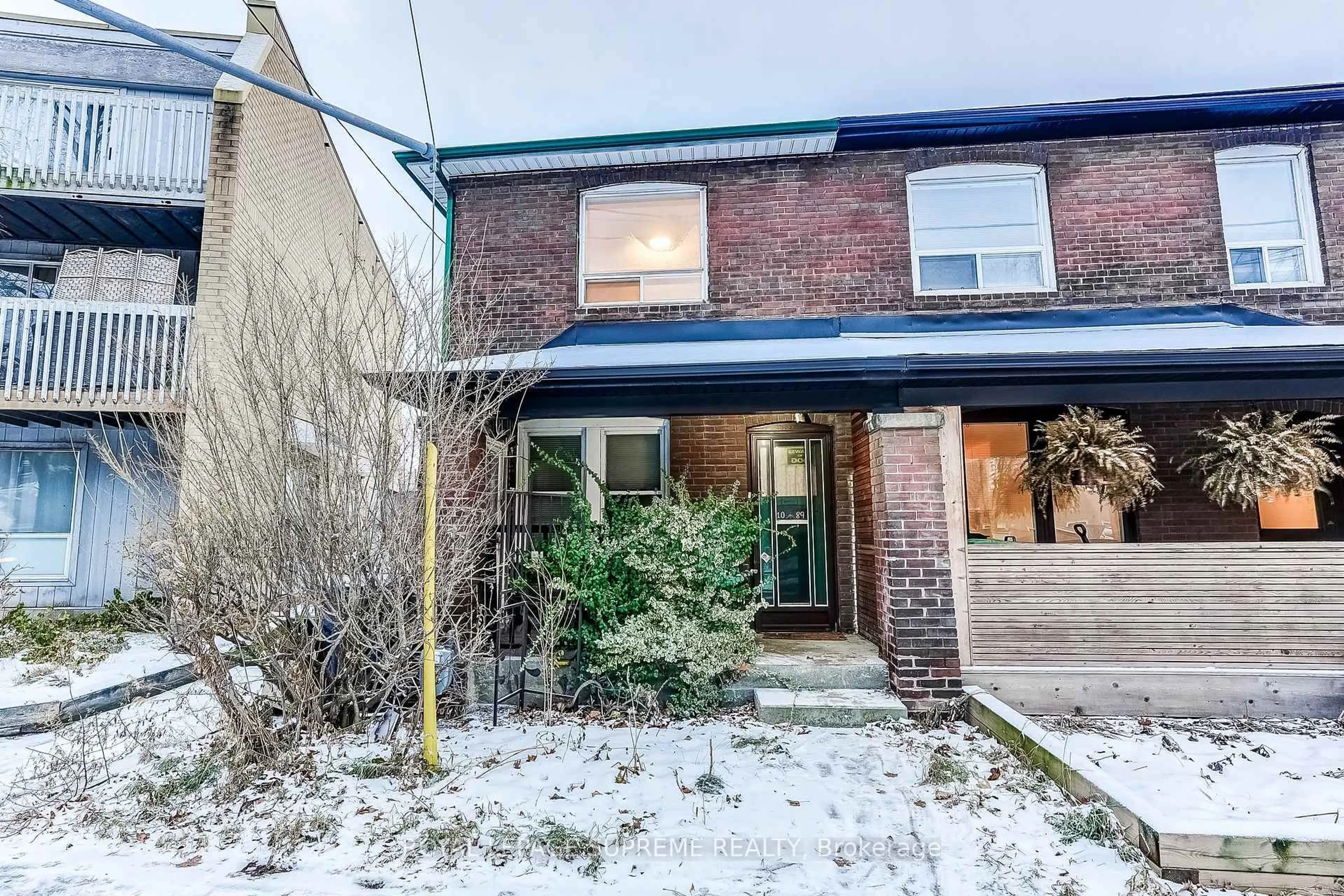 Home with brick exterior material, street for 1089 Davenport Rd, Toronto Ontario M6G 2C3