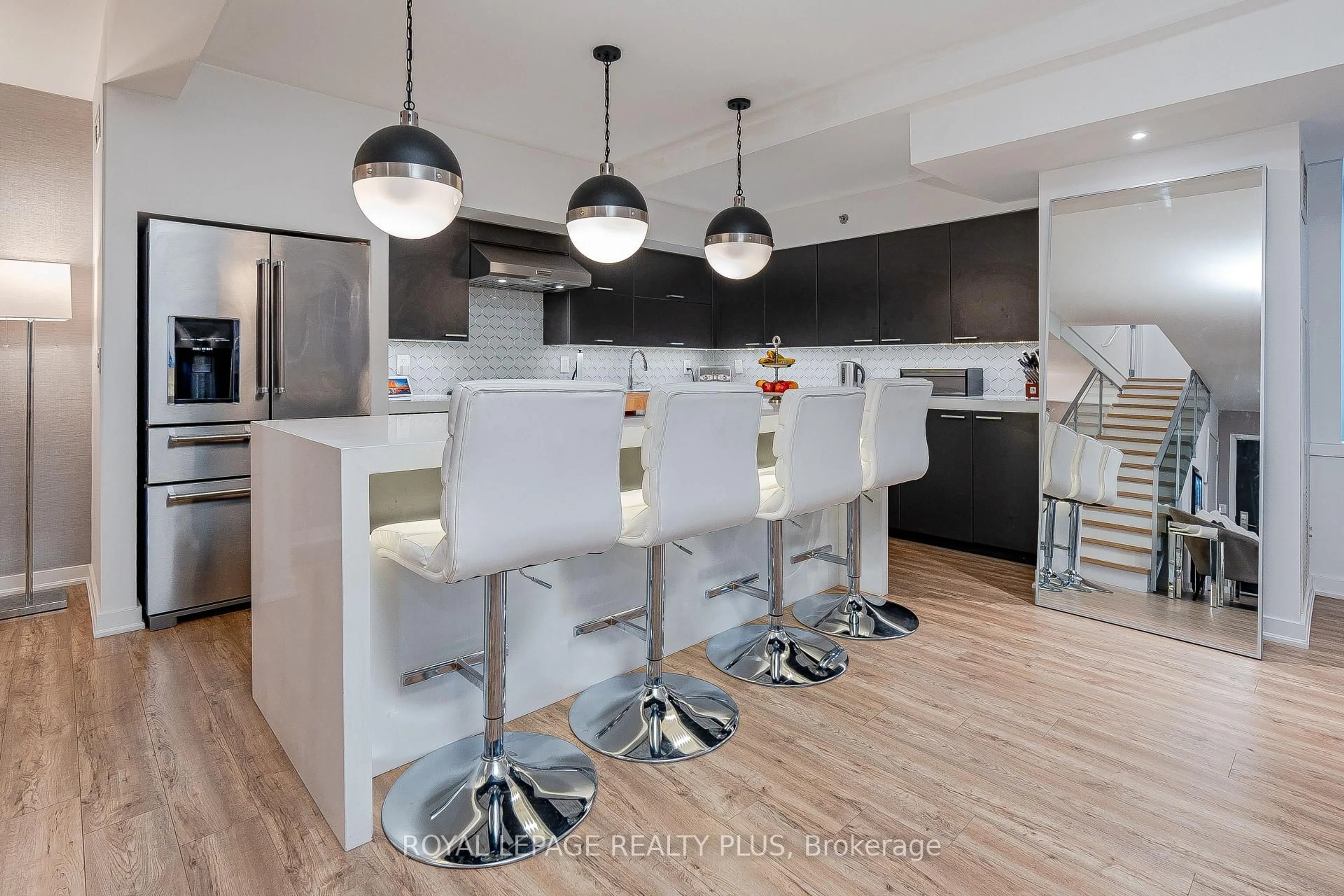 Contemporary kitchen, wood/laminate floor for 55 Stewart St #117, Toronto Ontario M5V 2V1