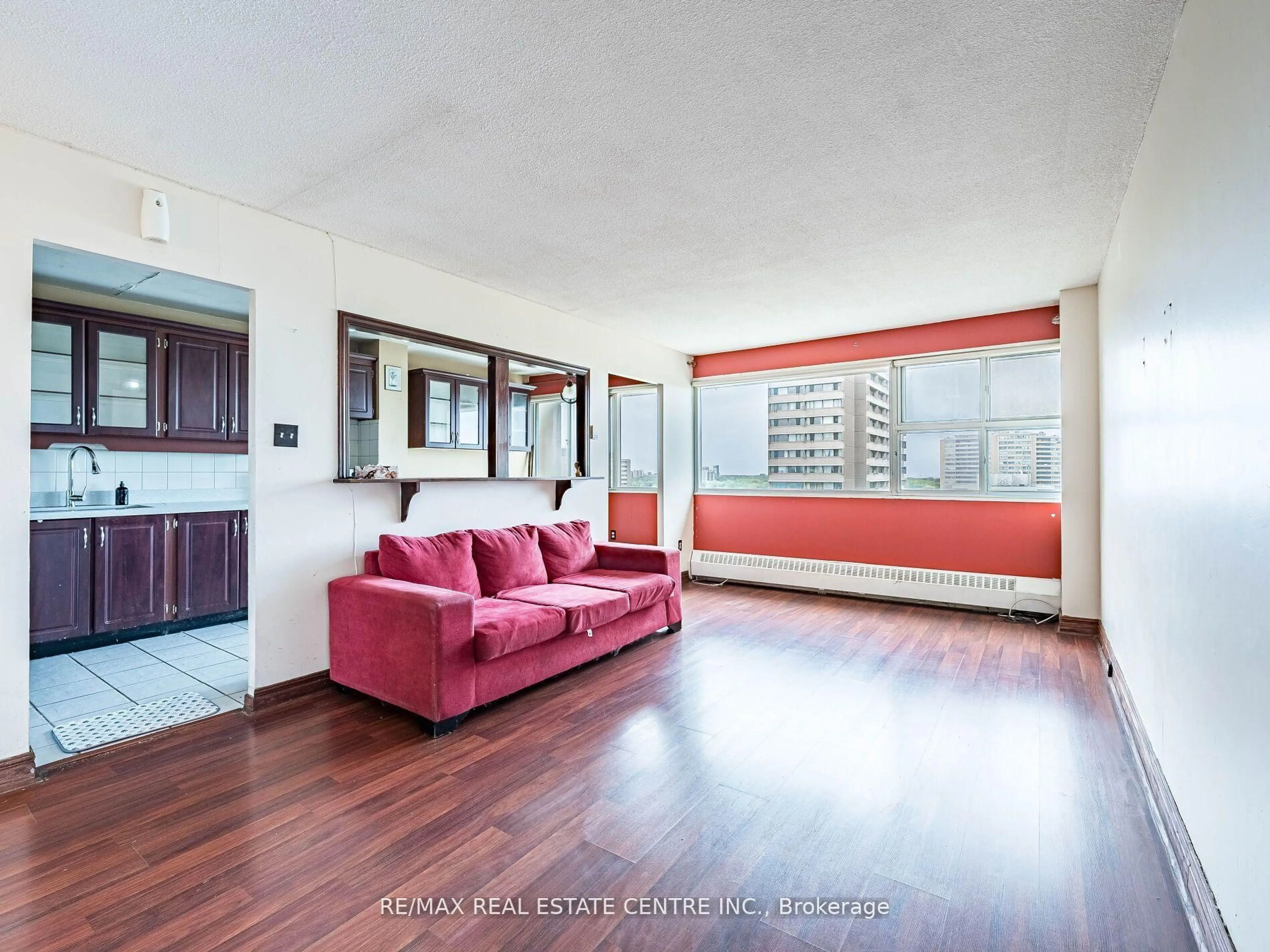 Living room with furniture, wood/laminate floor for 735 Don Mills Rd #1806, Toronto Ontario M3C 1T1