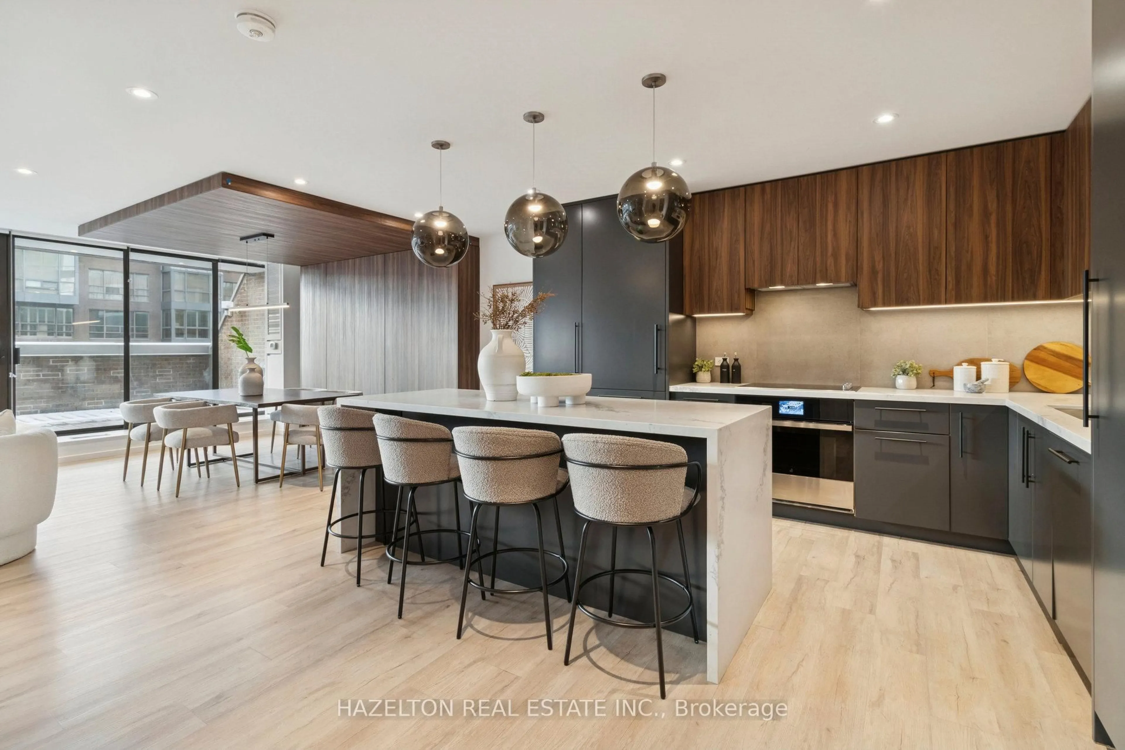 Contemporary kitchen, wood/laminate floor for 55A Avenue Rd #405, Toronto Ontario M5R 3L2
