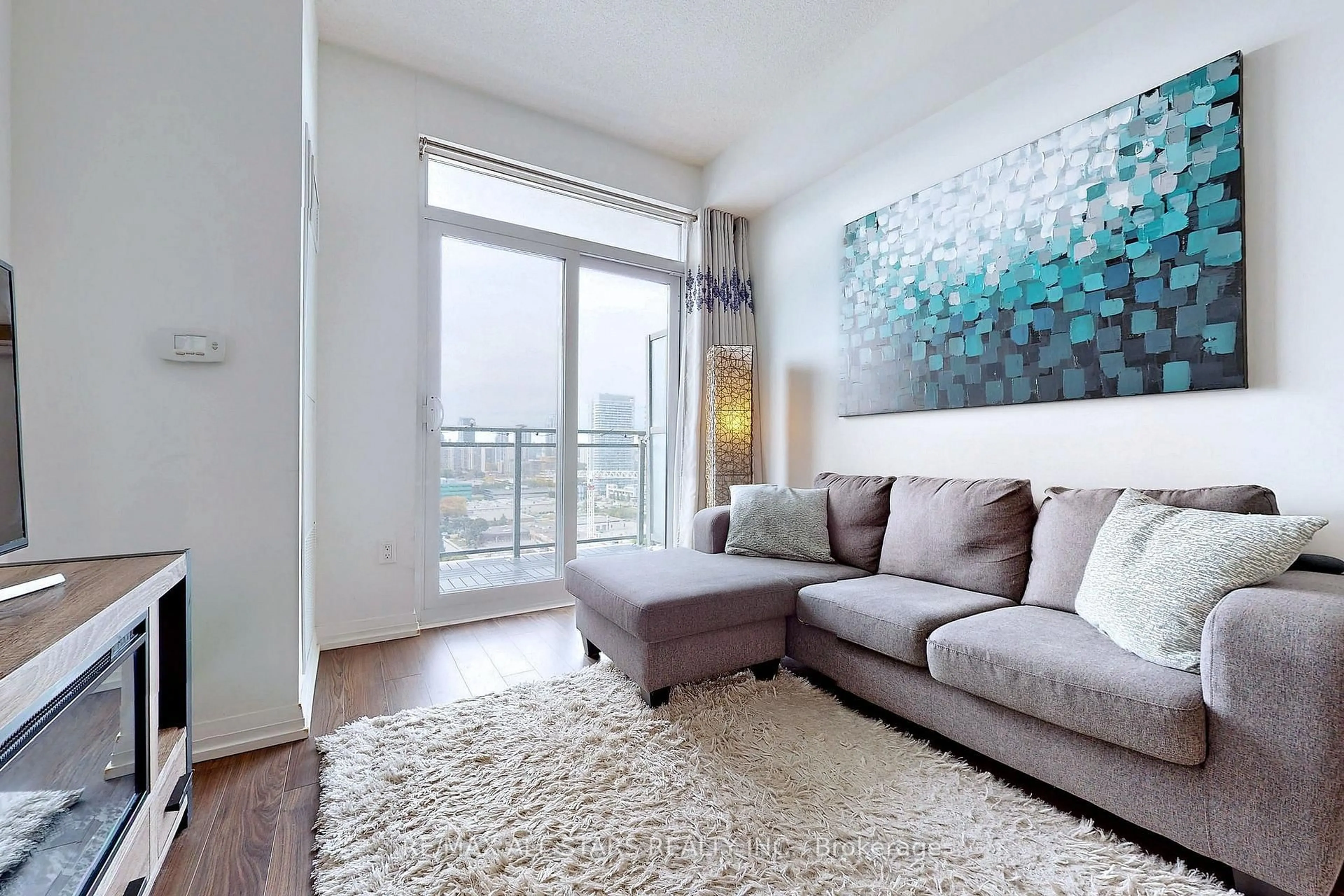 Living room with furniture, carpet floor for 55 Ann O'Reilly Rd #1709, Toronto Ontario M2J 0E1