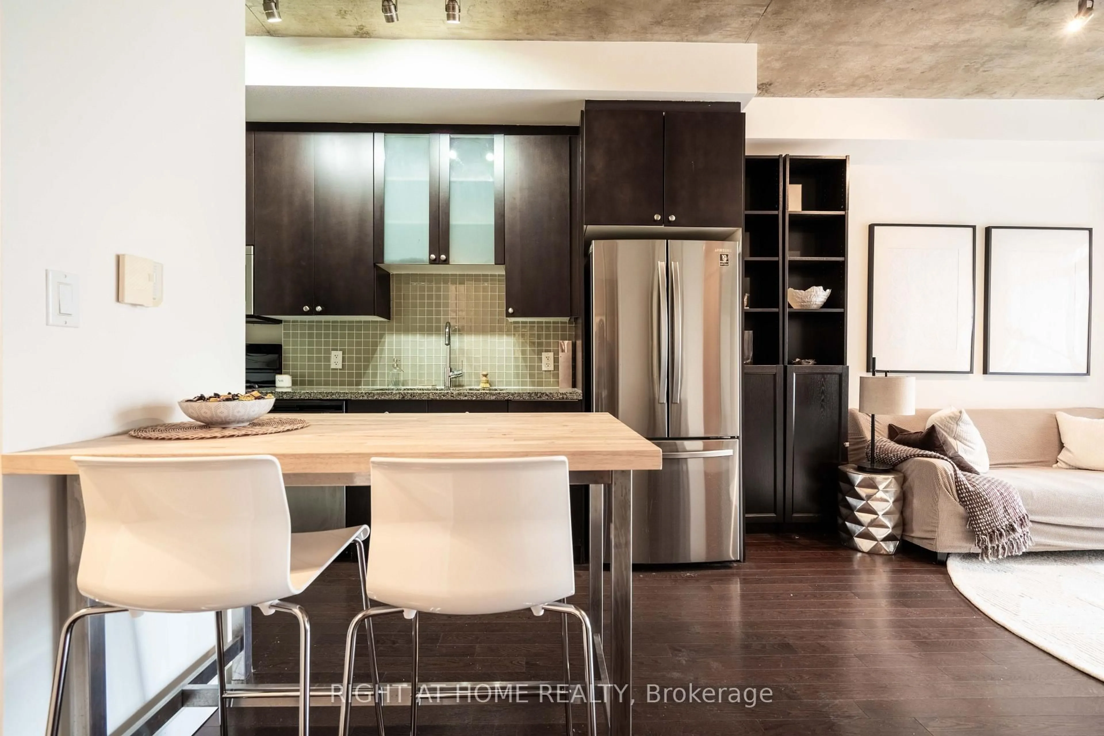 Contemporary kitchen, ceramic/tile floor for 1 Shaw St #413, Toronto Ontario M6K 0A1