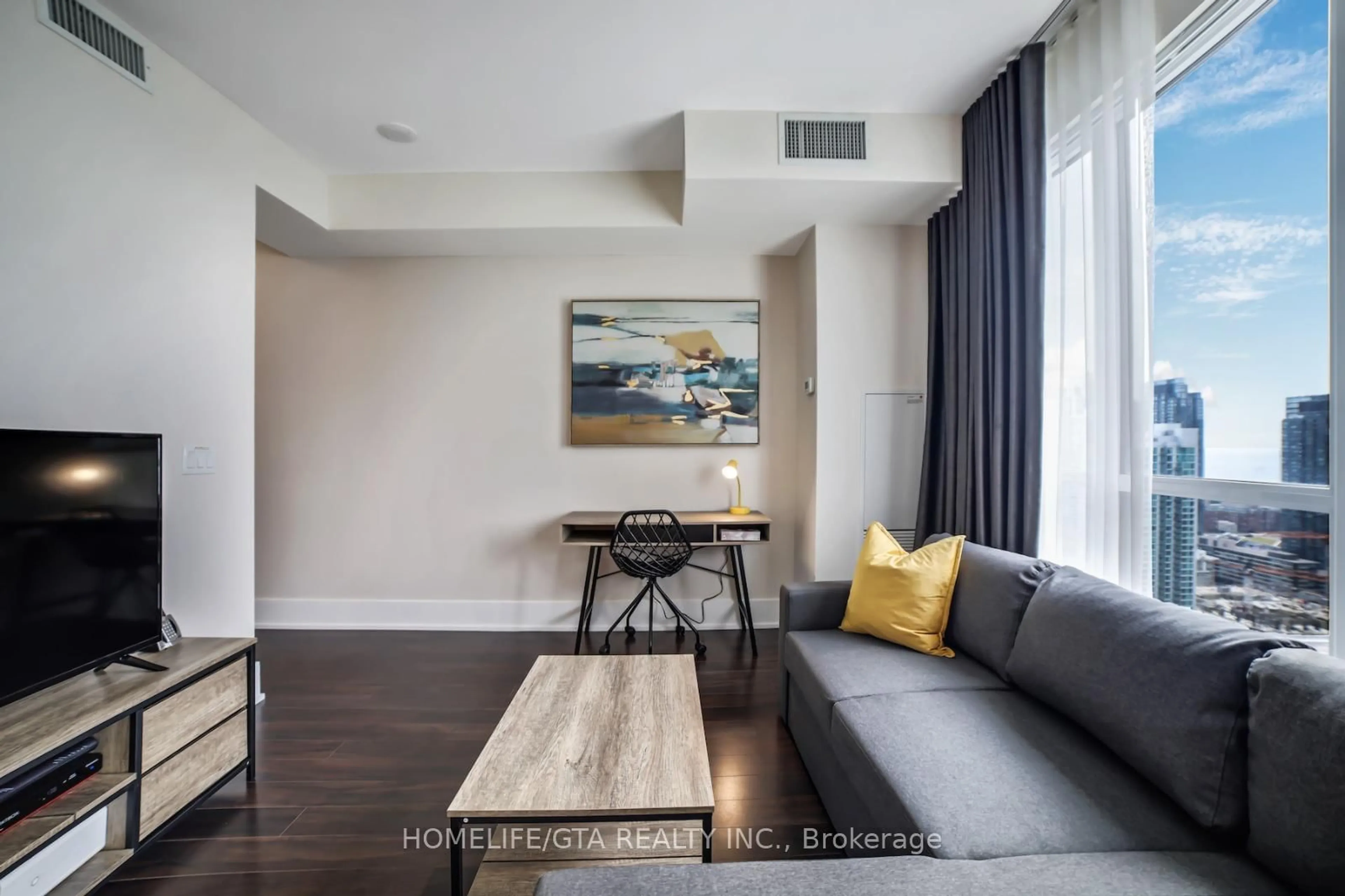 Living room with furniture, unknown for 300 Front St #3214, Toronto Ontario M5V 0E9