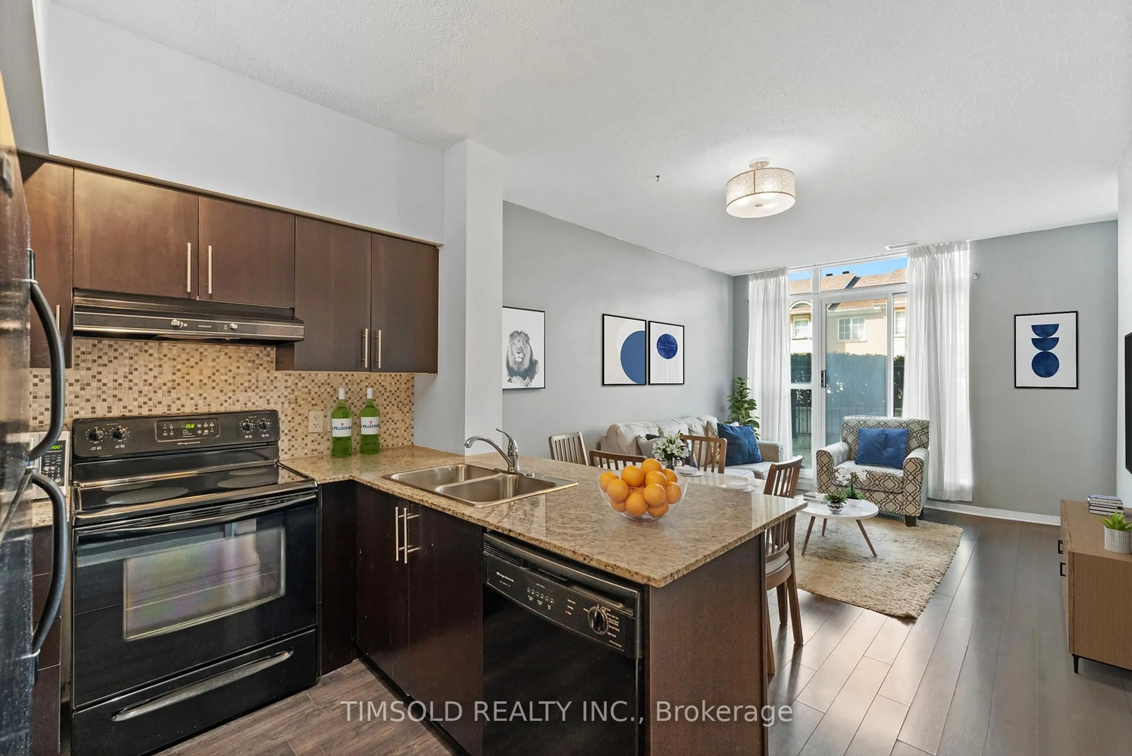 Open concept kitchen, ceramic/tile floor for 120 Dallimore Circ #102, Toronto Ontario M3C 4J1