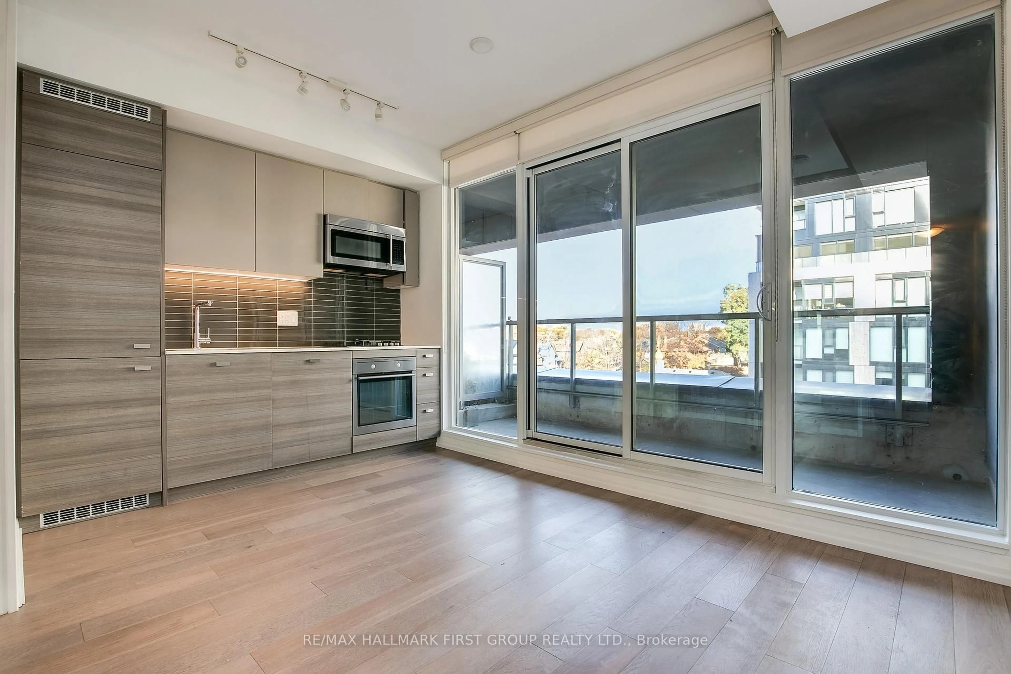 Open concept kitchen, unknown for 835 St Clair Ave #401, Toronto Ontario M6C 2N5