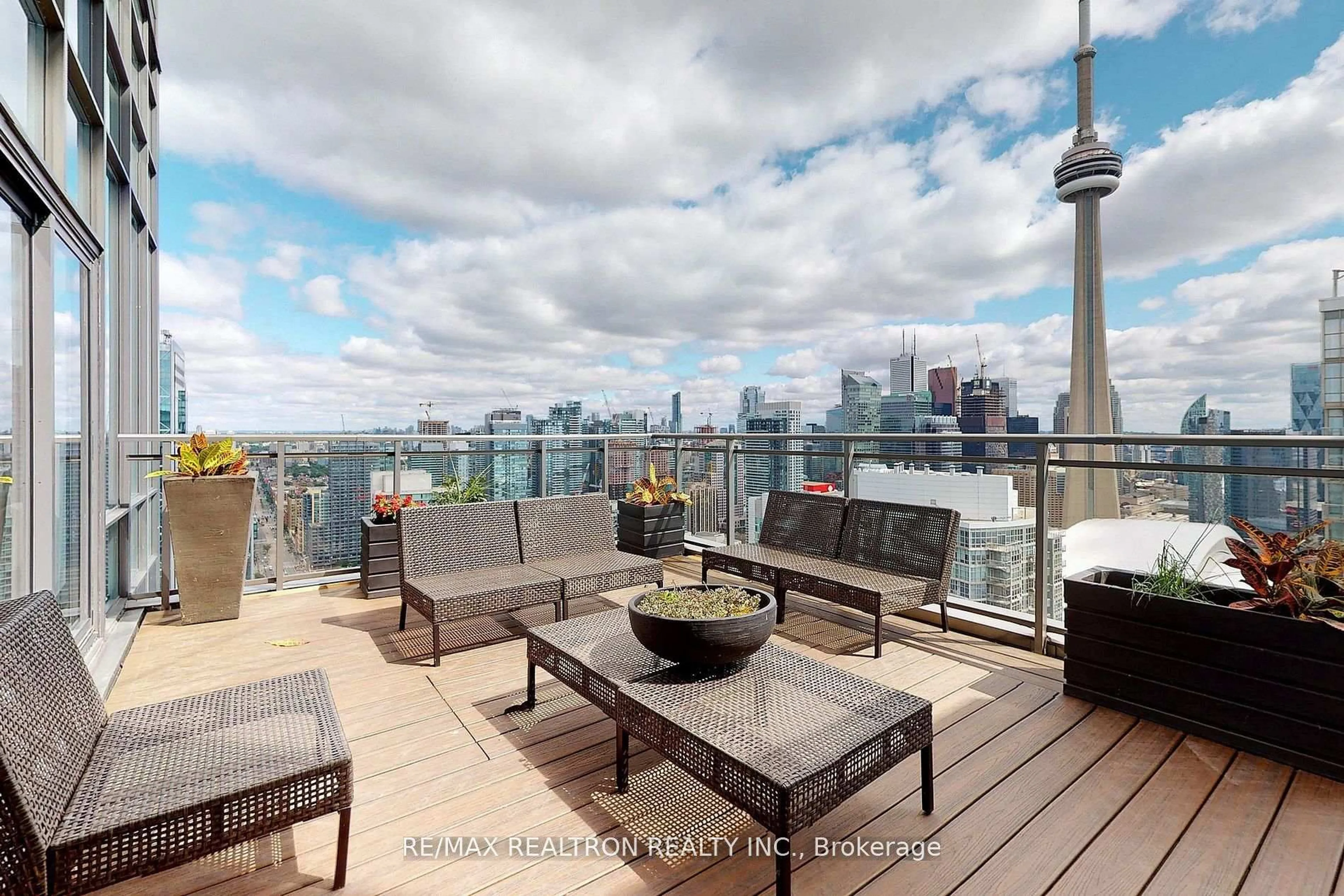 Patio, city buildings view from balcony for 11 Brunel Crt #PH2, Toronto Ontario M5V 3Y3
