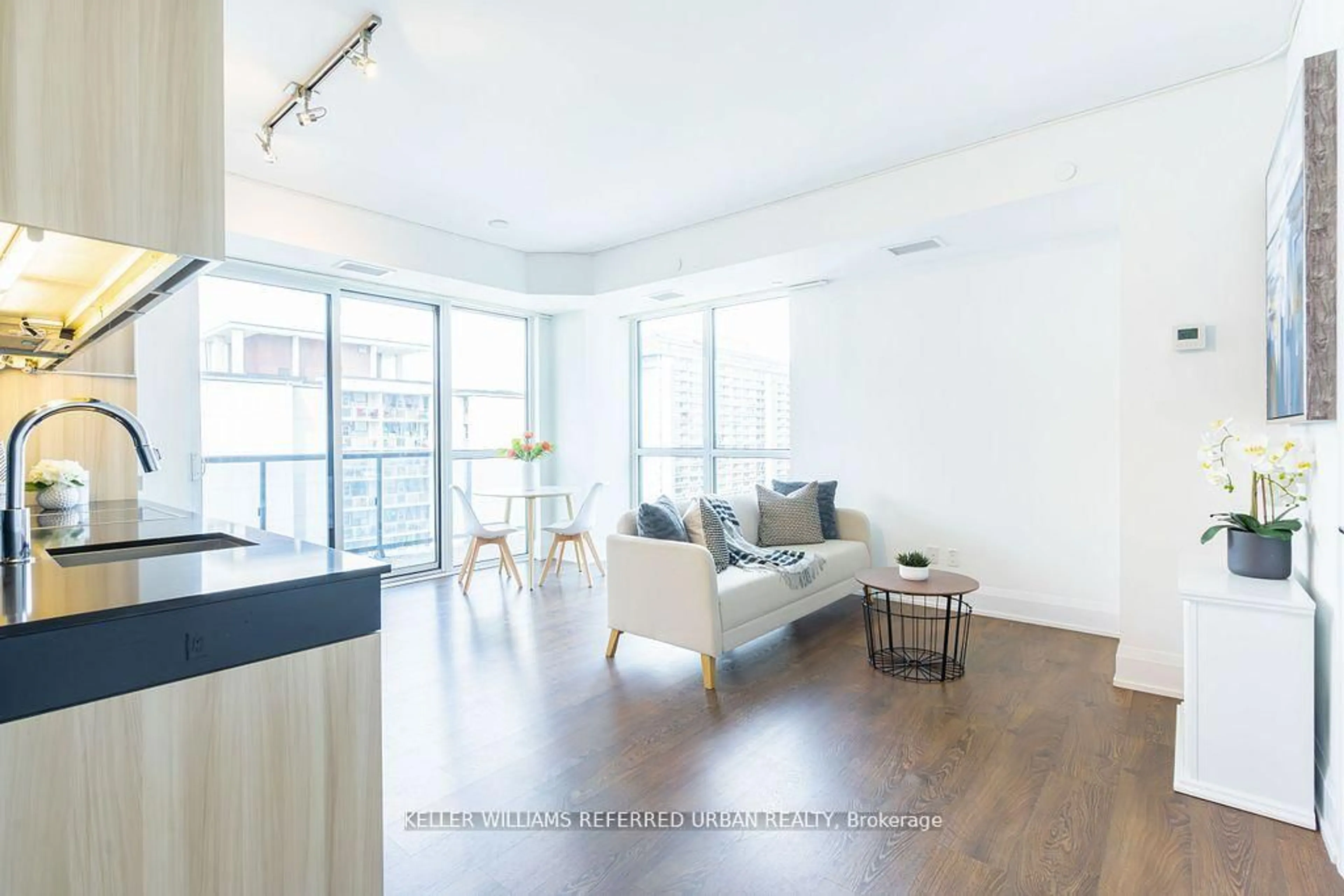 Living room with furniture, wood/laminate floor for 101 Erskine Ave #1802, Toronto Ontario M4P 1Y5