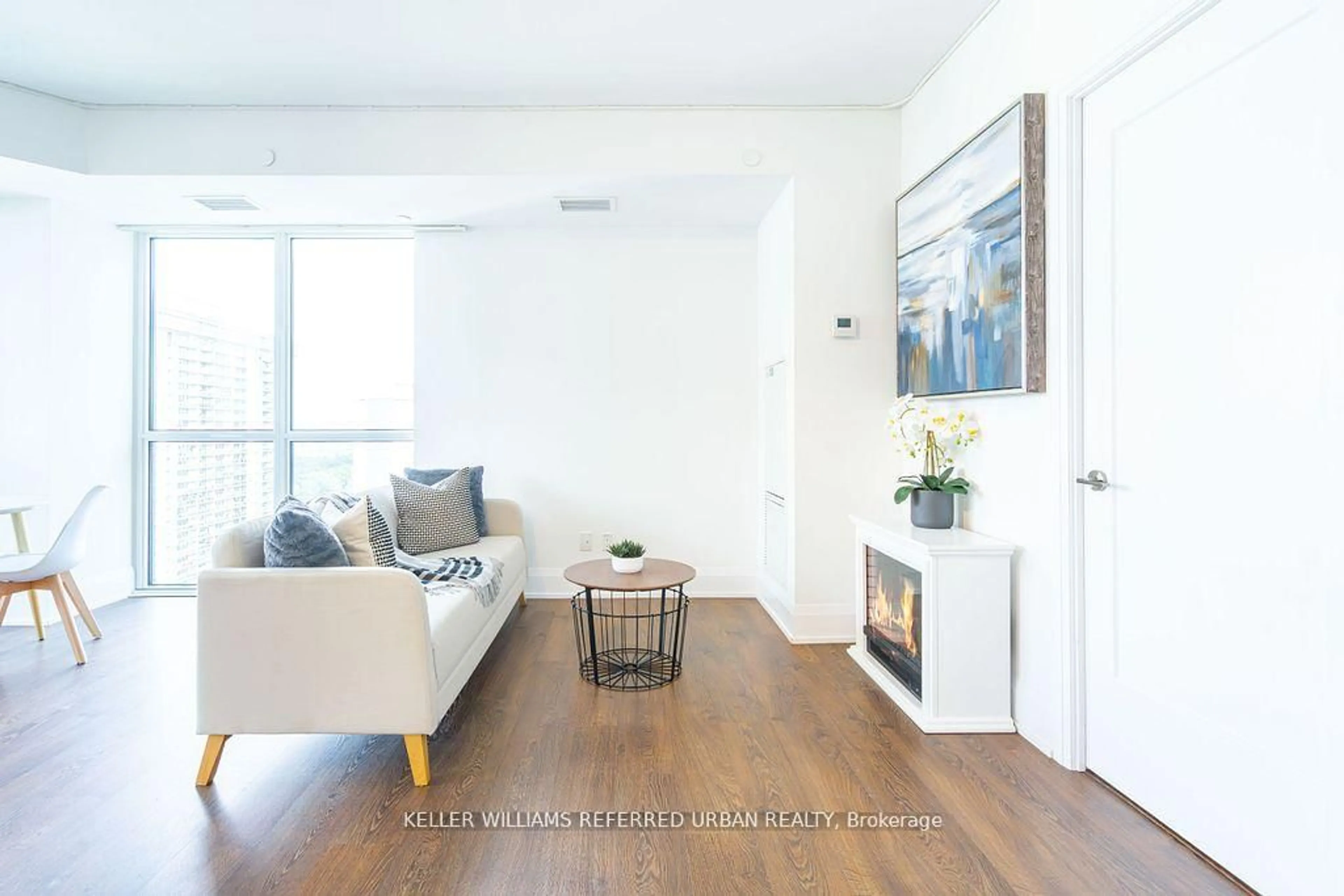 Living room with furniture, wood/laminate floor for 101 Erskine Ave #1802, Toronto Ontario M4P 1Y5
