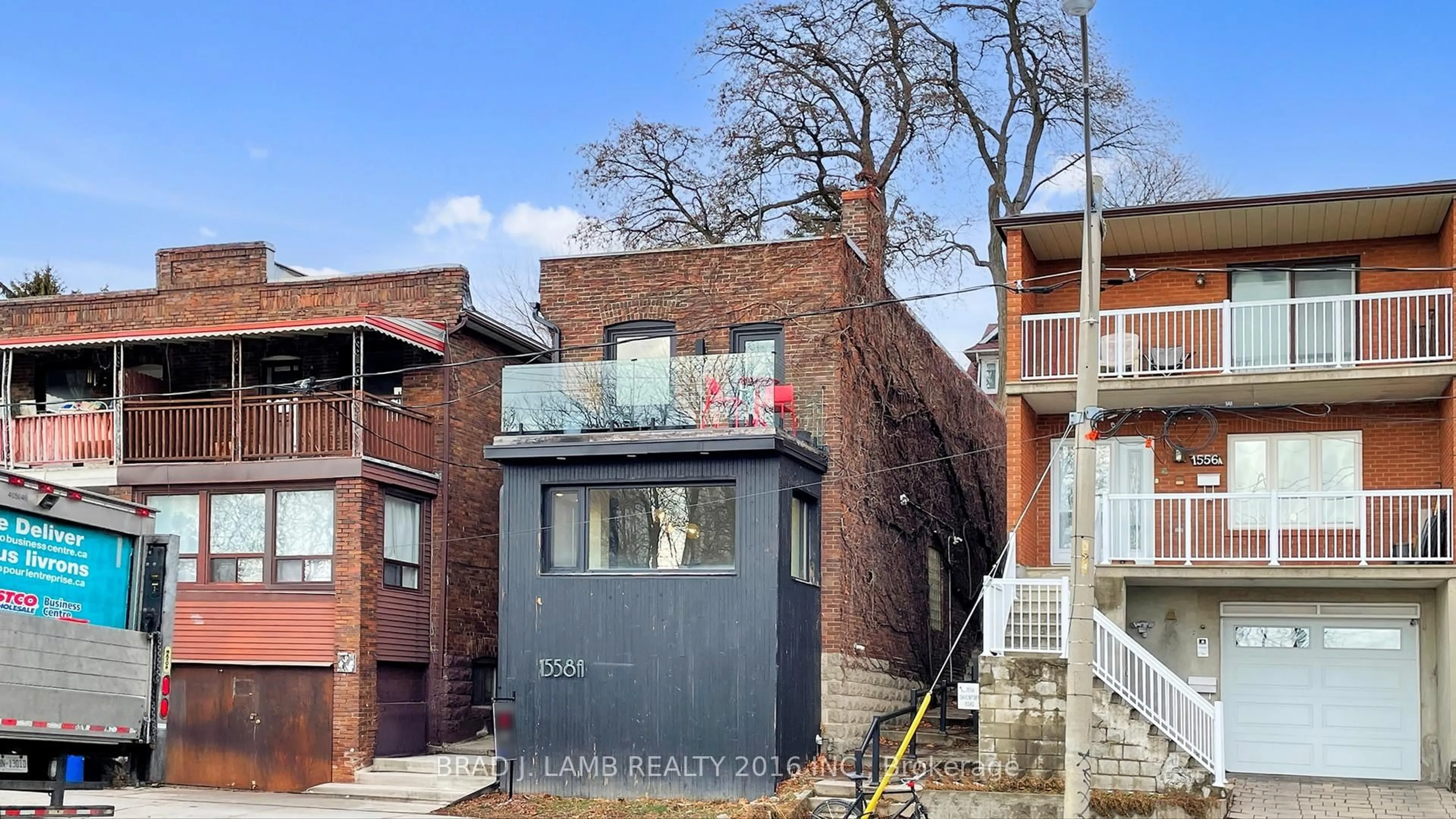 Home with brick exterior material, street for 1558 A Davenport Rd, Toronto Ontario M6H 2J1