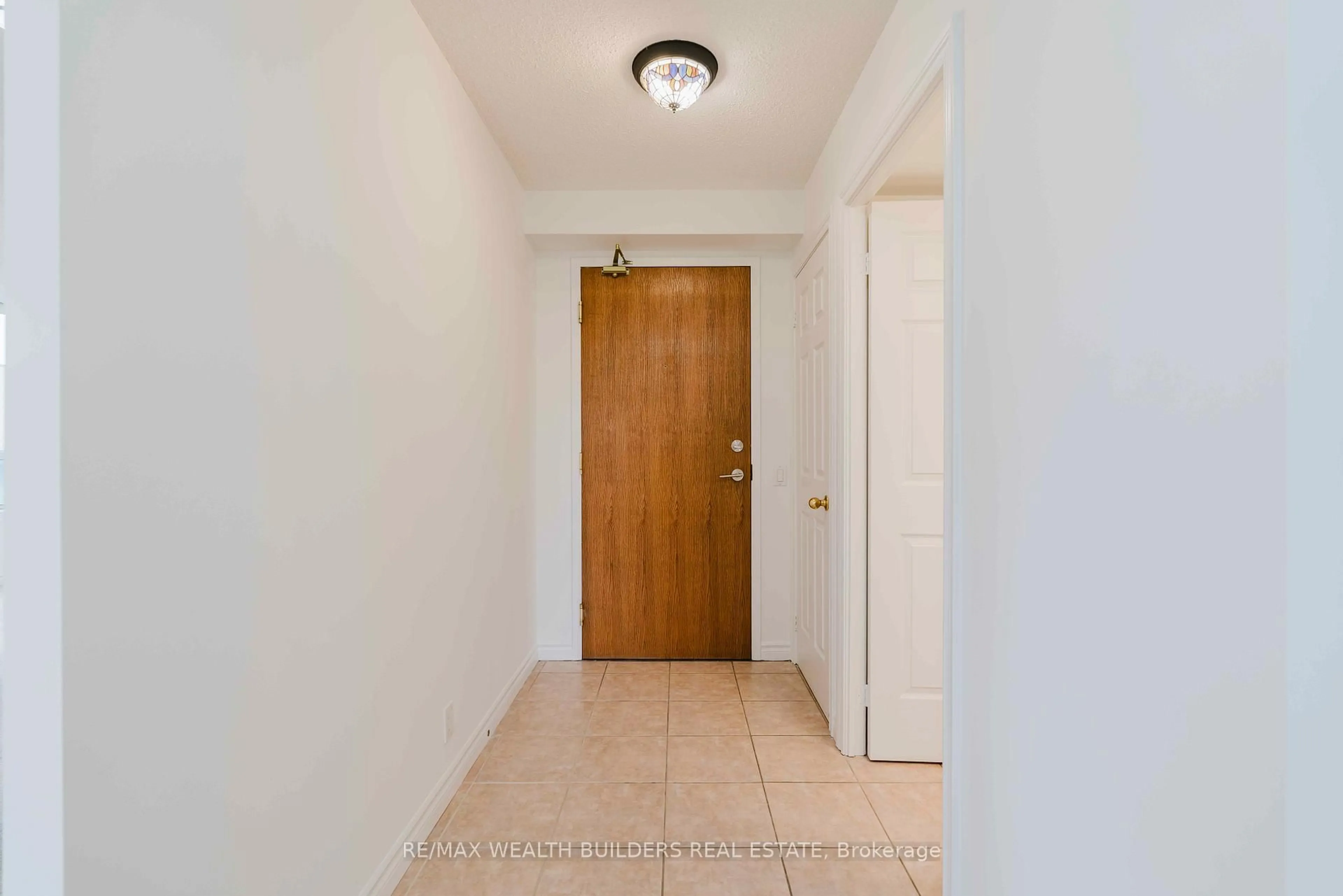 Indoor entryway for 1720 Eglinton Ave #305, Toronto Ontario M4A 2X8