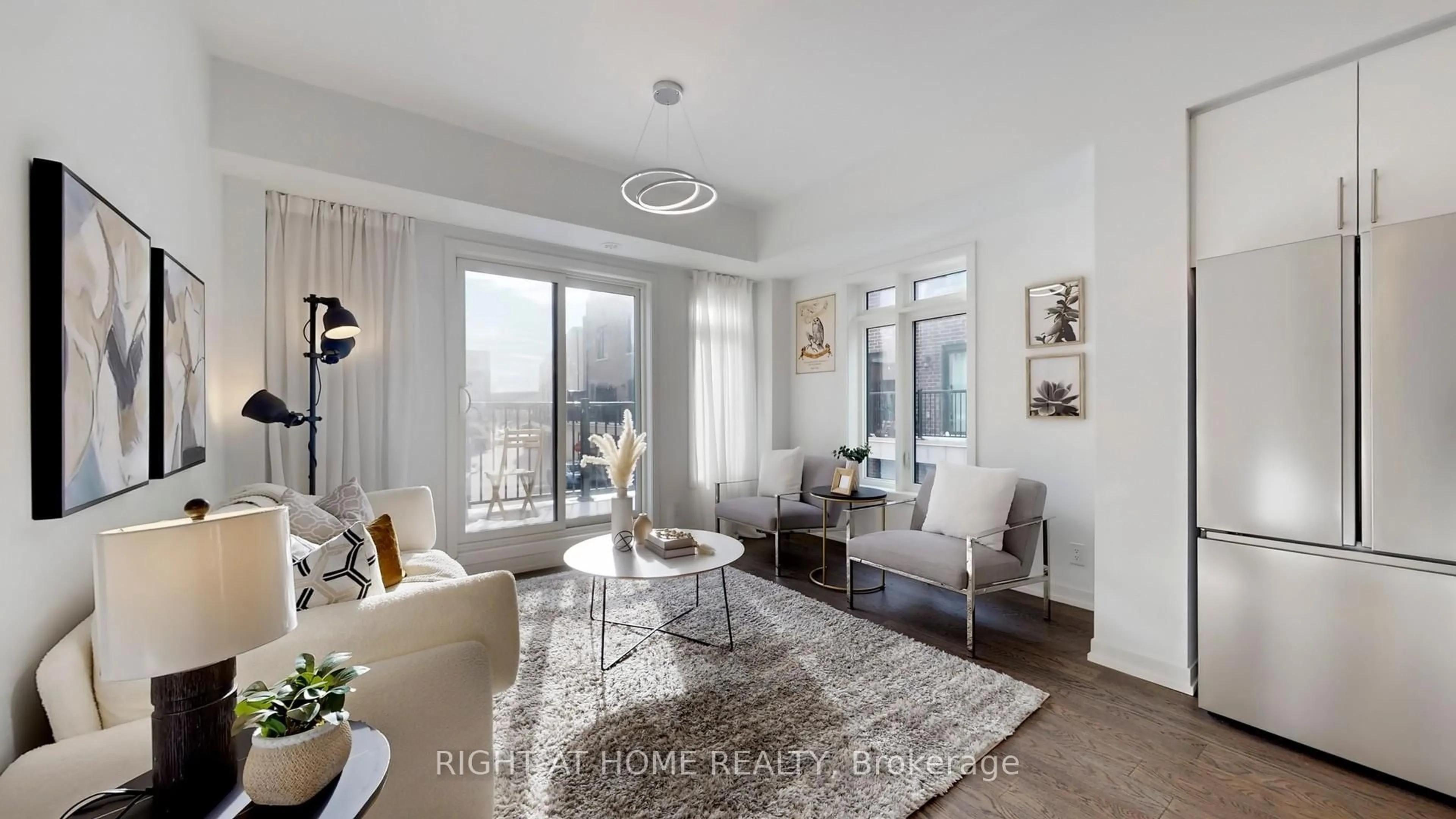Living room with furniture, wood/laminate floor for 32 SPRUCE PINES Cres, Toronto Ontario M4A 2X2