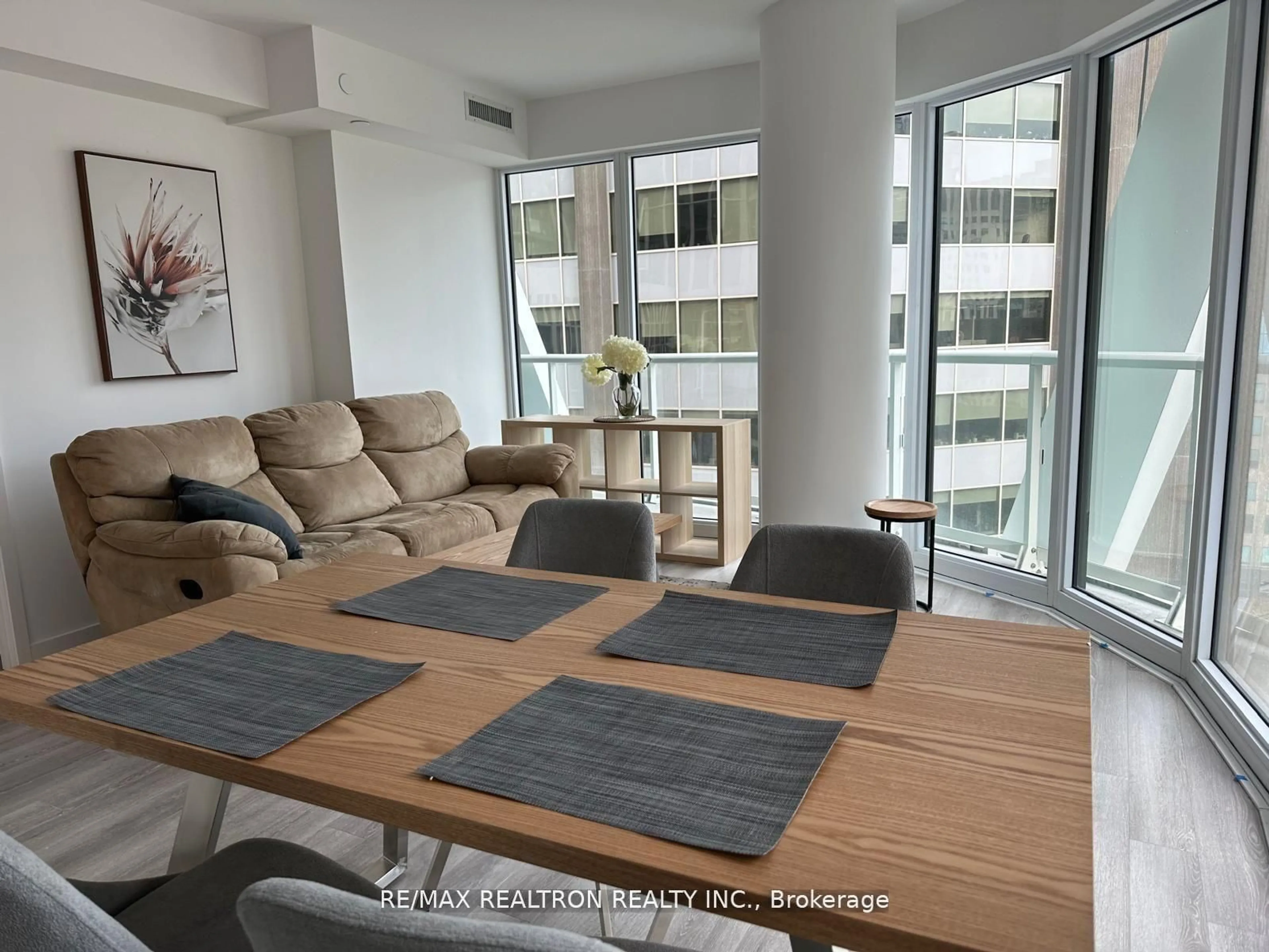 Living room with furniture, unknown for 230 Simcoe St #926, Toronto Ontario M5T 1T4