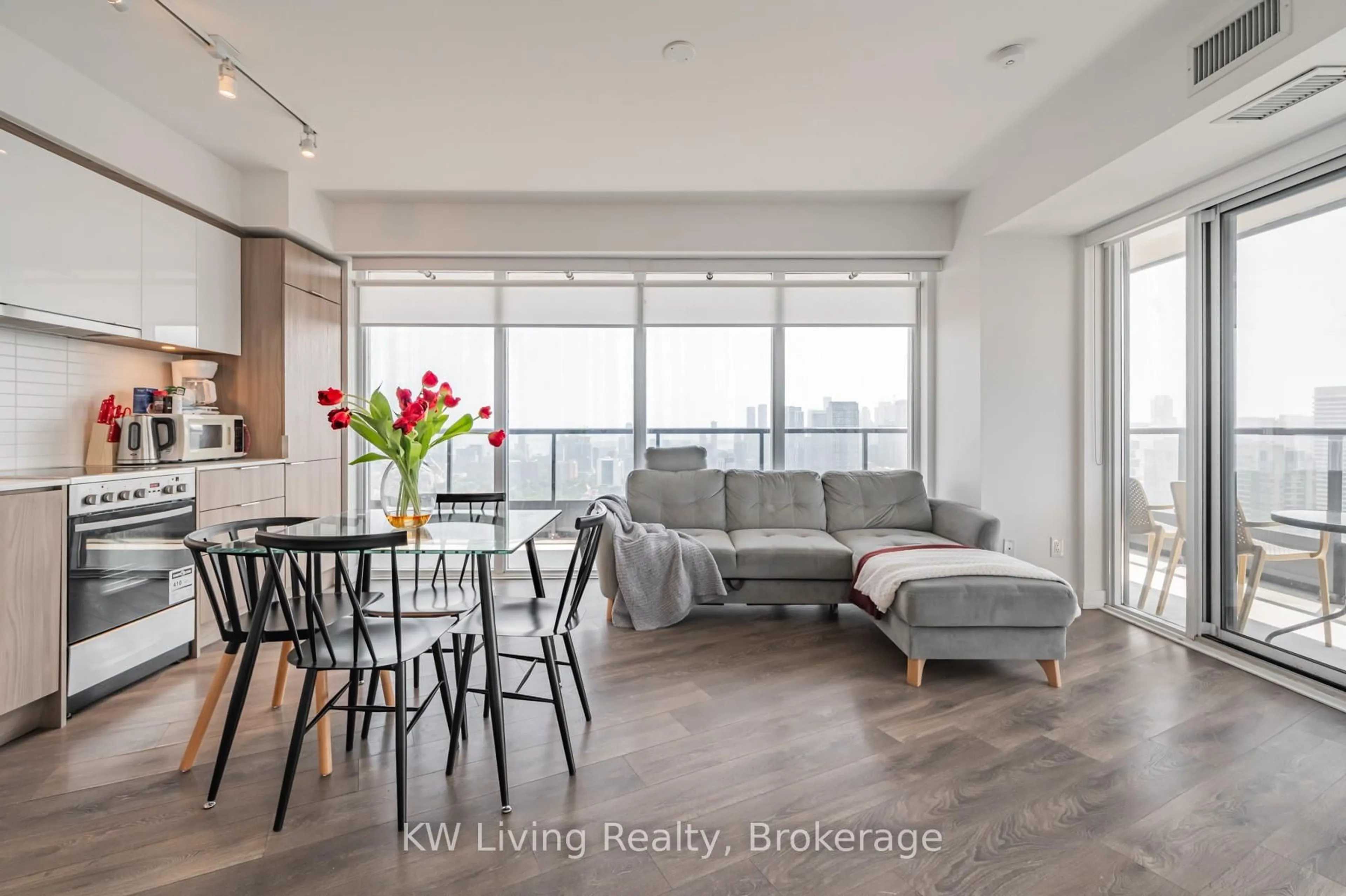 Living room with furniture, wood/laminate floor for 159 Wellesley St #3307, Toronto Ontario M4Y 0H5