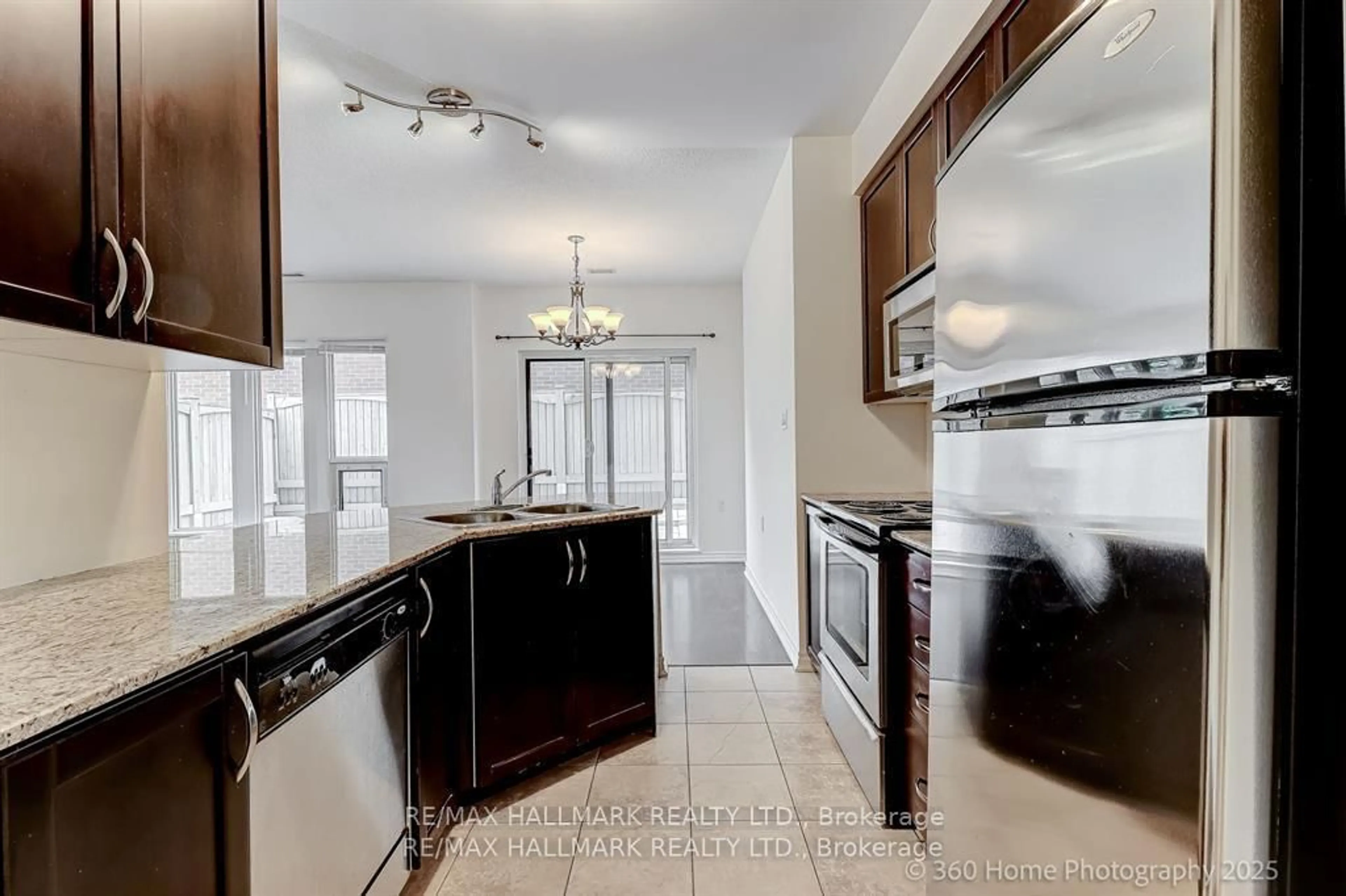 Open concept kitchen, ceramic/tile floor for 872 Sheppard Ave #105, Toronto Ontario M3H 5V5