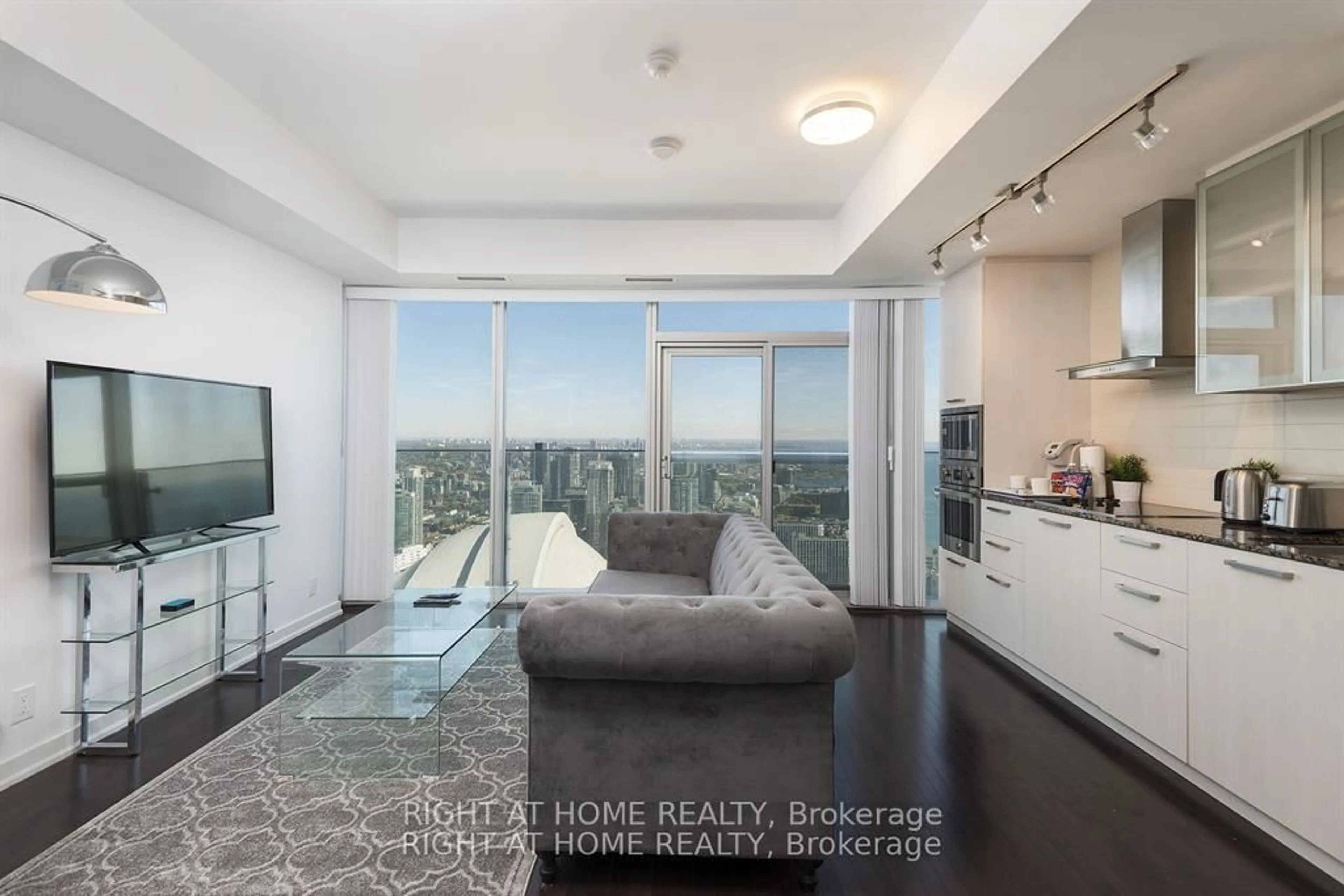 Living room with furniture, unknown for 12 York St #4906, Toronto Ontario M5J 2Z2